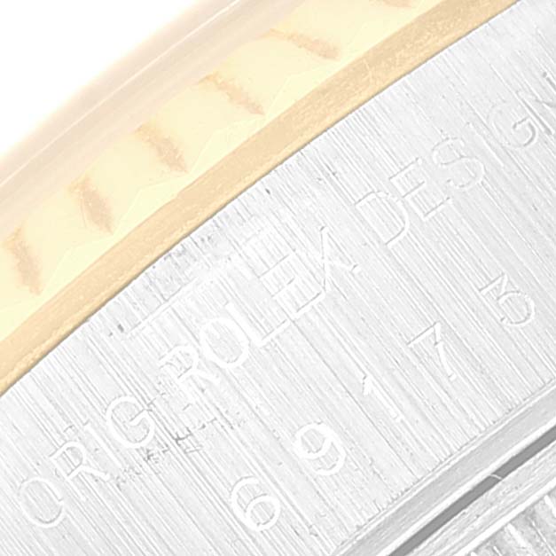 This image shows a close-up of the bezel and engraved model number on a Rolex Datejust 69173 Women's Steel and Gold (two tone) Champagne Dial 69173 Women's Steel and Gold (two tone) Champagne Dial watch.