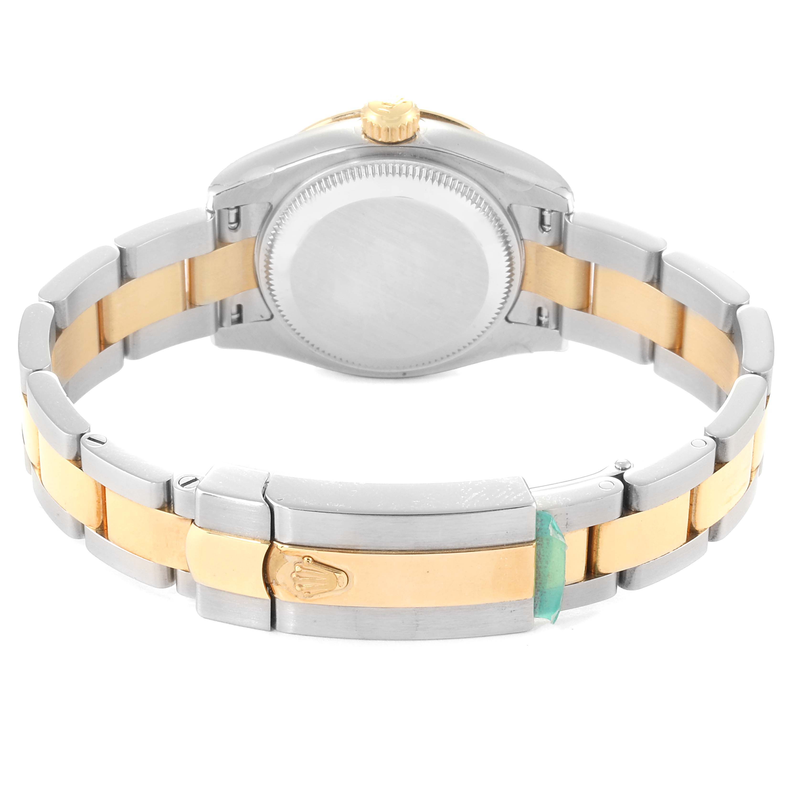 The image shows the back view of a Rolex Datejust 179313 Women
s Steel and Gold (two tone) Champagne Dial 179313 Women
s Steel and Gold (two tone) Champagne Dial watch, focusing on the caseback and two-tone bracelet.