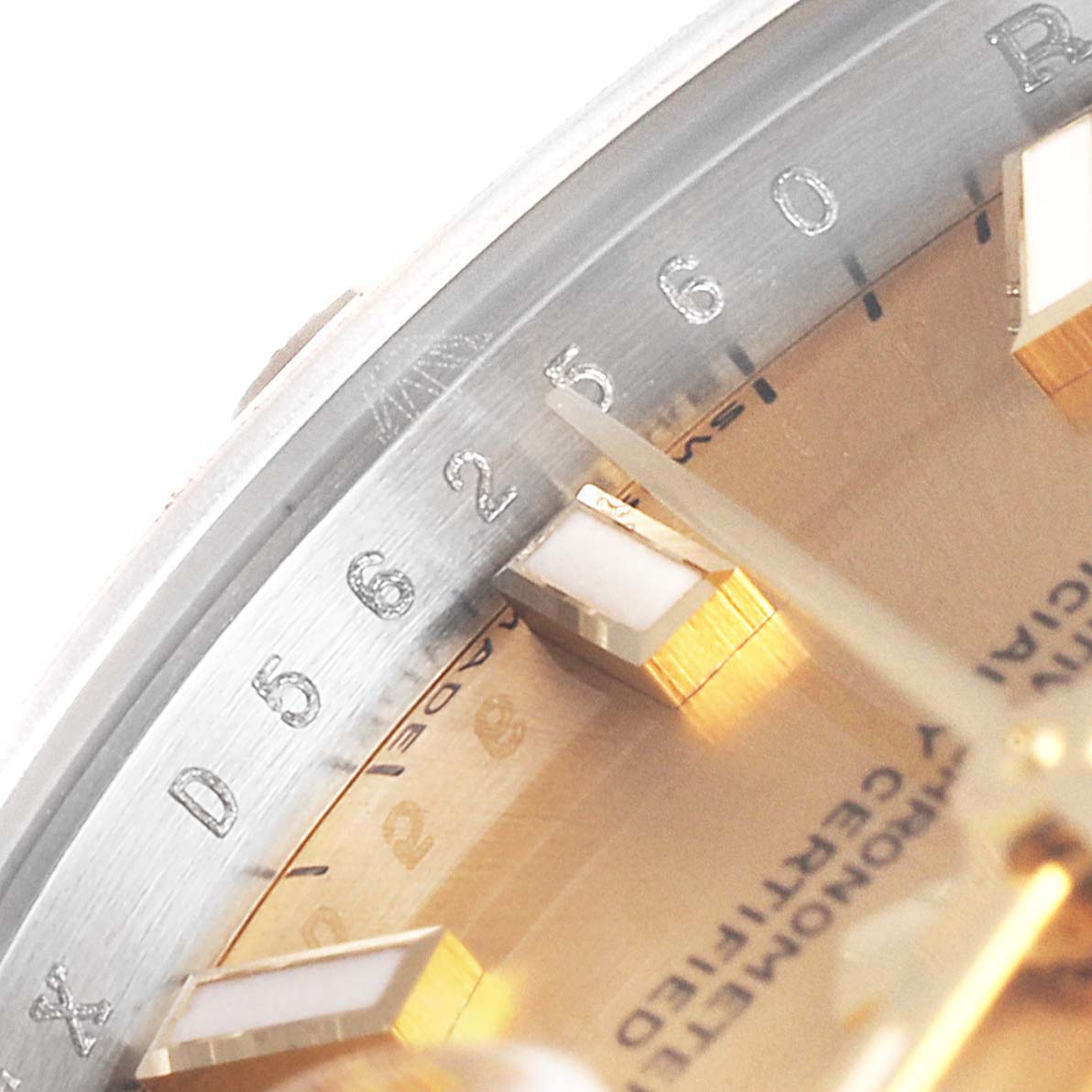 The image shows a close-up of the dial and part of the bezel of a Rolex Datejust 179313 Women
s Steel and Gold (two tone) Champagne Dial 179313 Women
s Steel and Gold (two tone) Champagne Dial watch.