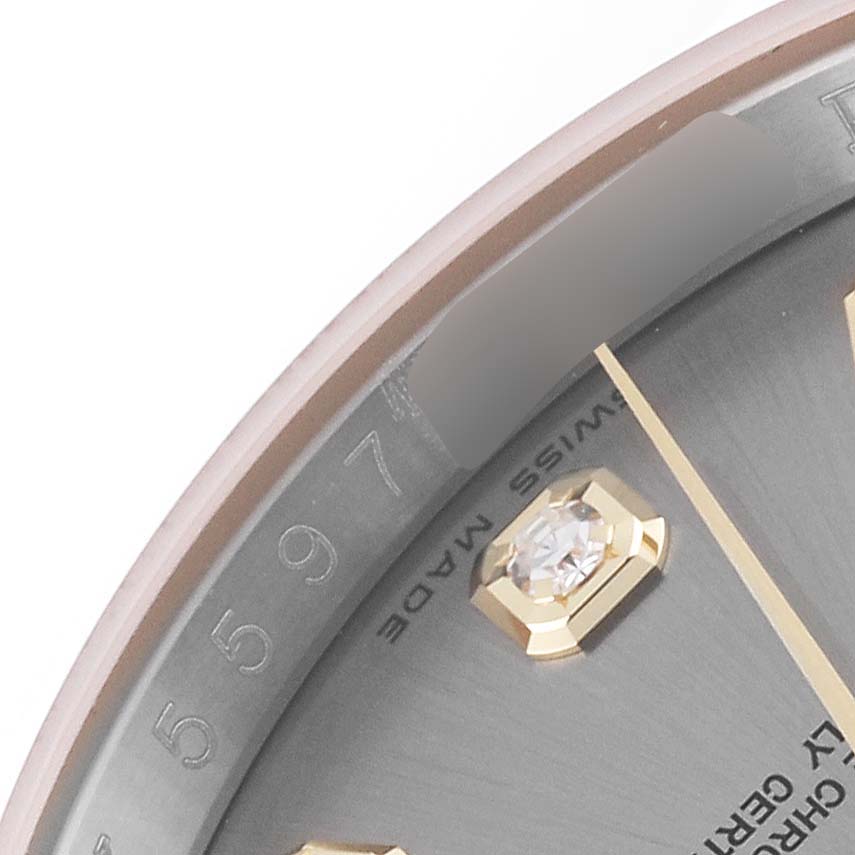 The image shows a close-up angle of the Rolex Datejust 116203 Men's Steel and Gold (two tone) Grey Dial 116203 Men's Steel and Gold (two tone) Grey Dial watch face, highlighting the diamond hour marker and part of the serial number.