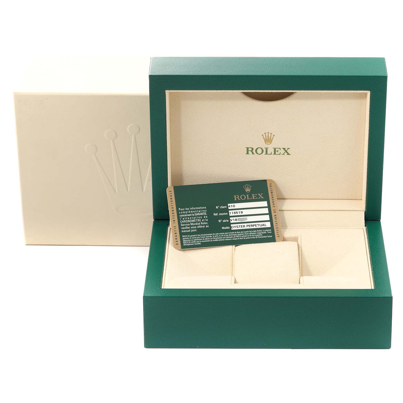 This is an open, empty Rolex watch box for the Daytona model, showing the interior and authenticity card.