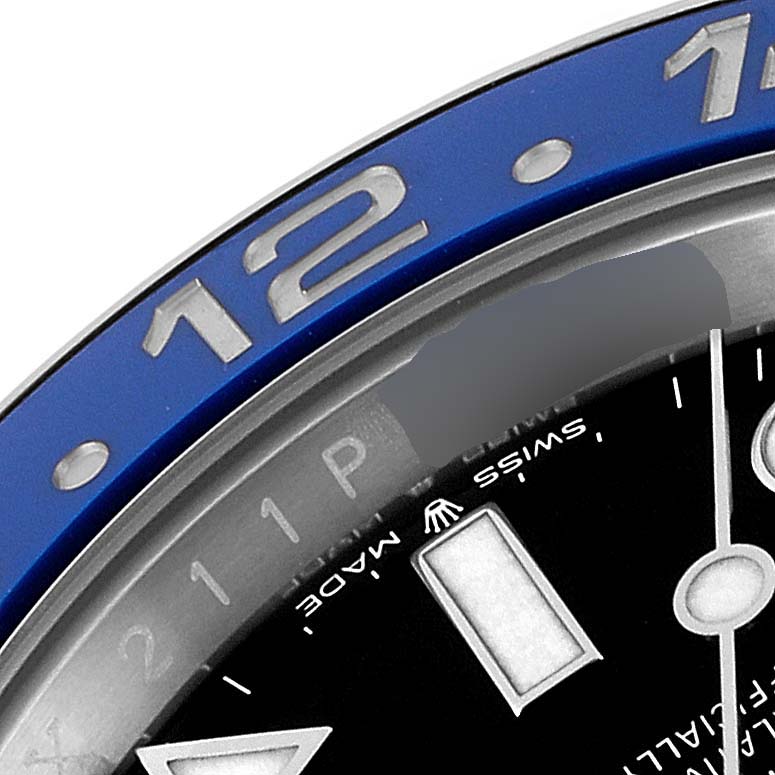 The image shows a close-up of the bezel and partial dial of a Rolex GMT-Master 126710 Men's Stainless Steel Black Dial 126710 Men's Stainless Steel Black Dial watch.