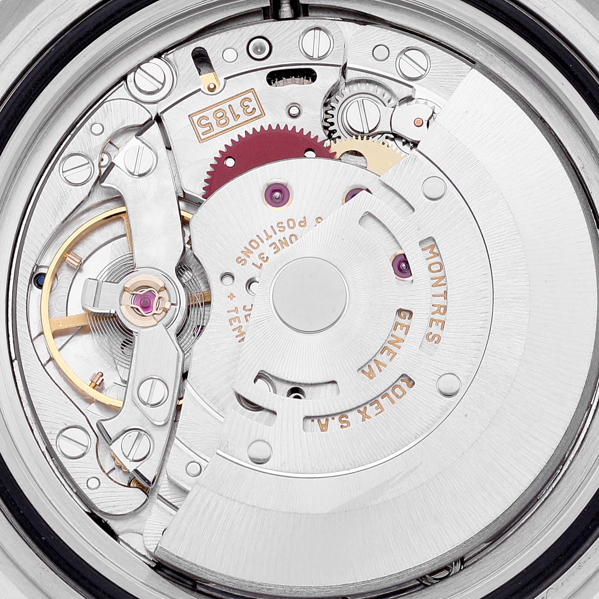 This close-up image shows the movement mechanism of the Rolex GMT-Master 16713 Men's Steel and Gold (two tone) Brown Dial 16713 Men's Steel and Gold (two tone) Brown Dial watch.