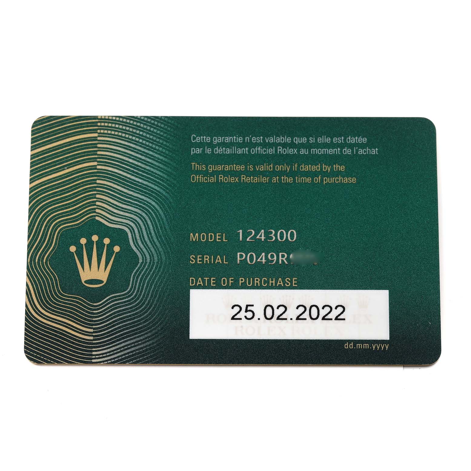 This image shows the warranty card for a Rolex Oyster Perpetual 124300 Men
s Stainless Steel Blue Dial 124300 Men
s Stainless Steel Blue Dial model 124300, detailing the serial number and purchase date.