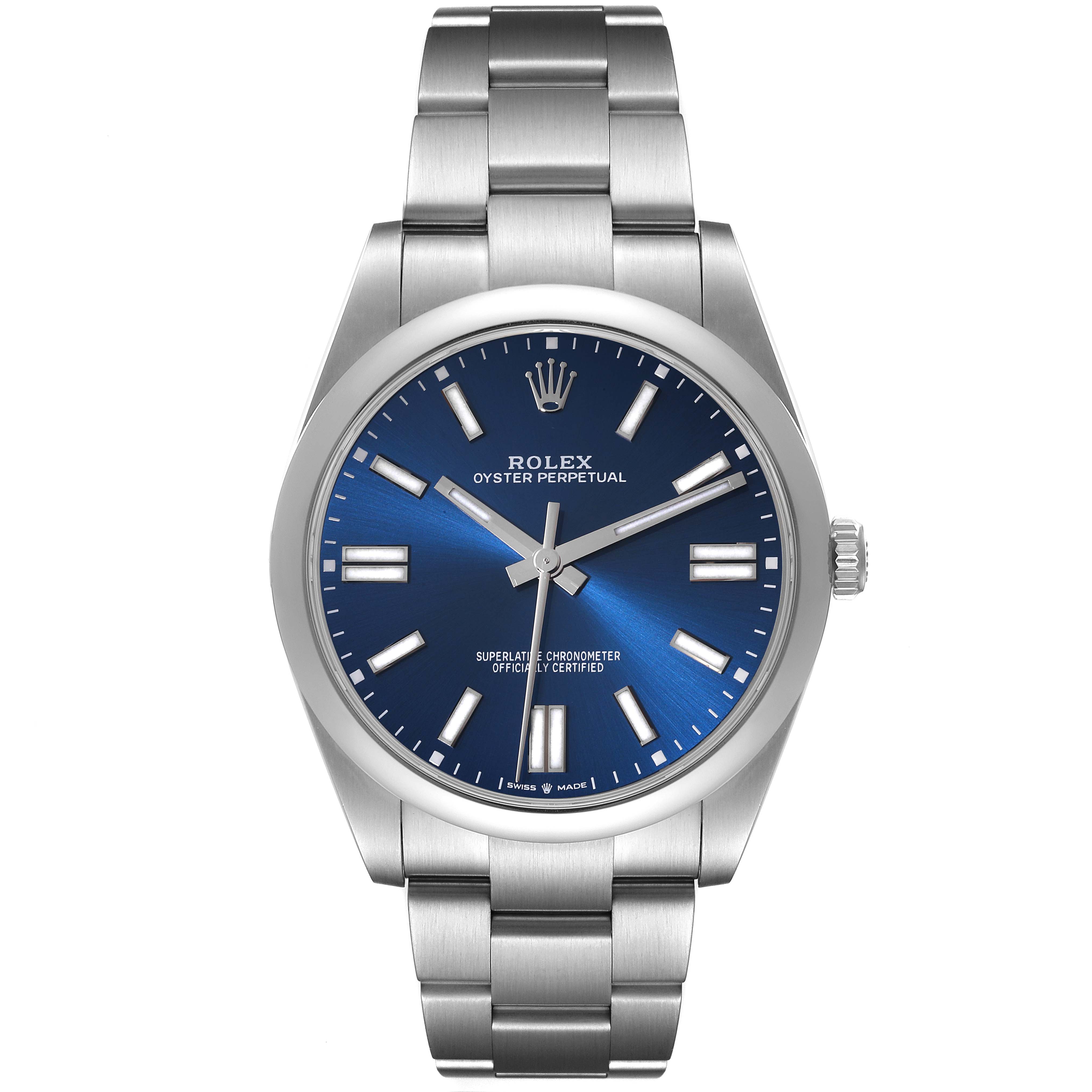 The image shows a front view of a Rolex Oyster Perpetual 124300 Men
s Stainless Steel Blue Dial 124300 Men
s Stainless Steel Blue Dial watch with a blue dial and a stainless steel bracelet.
