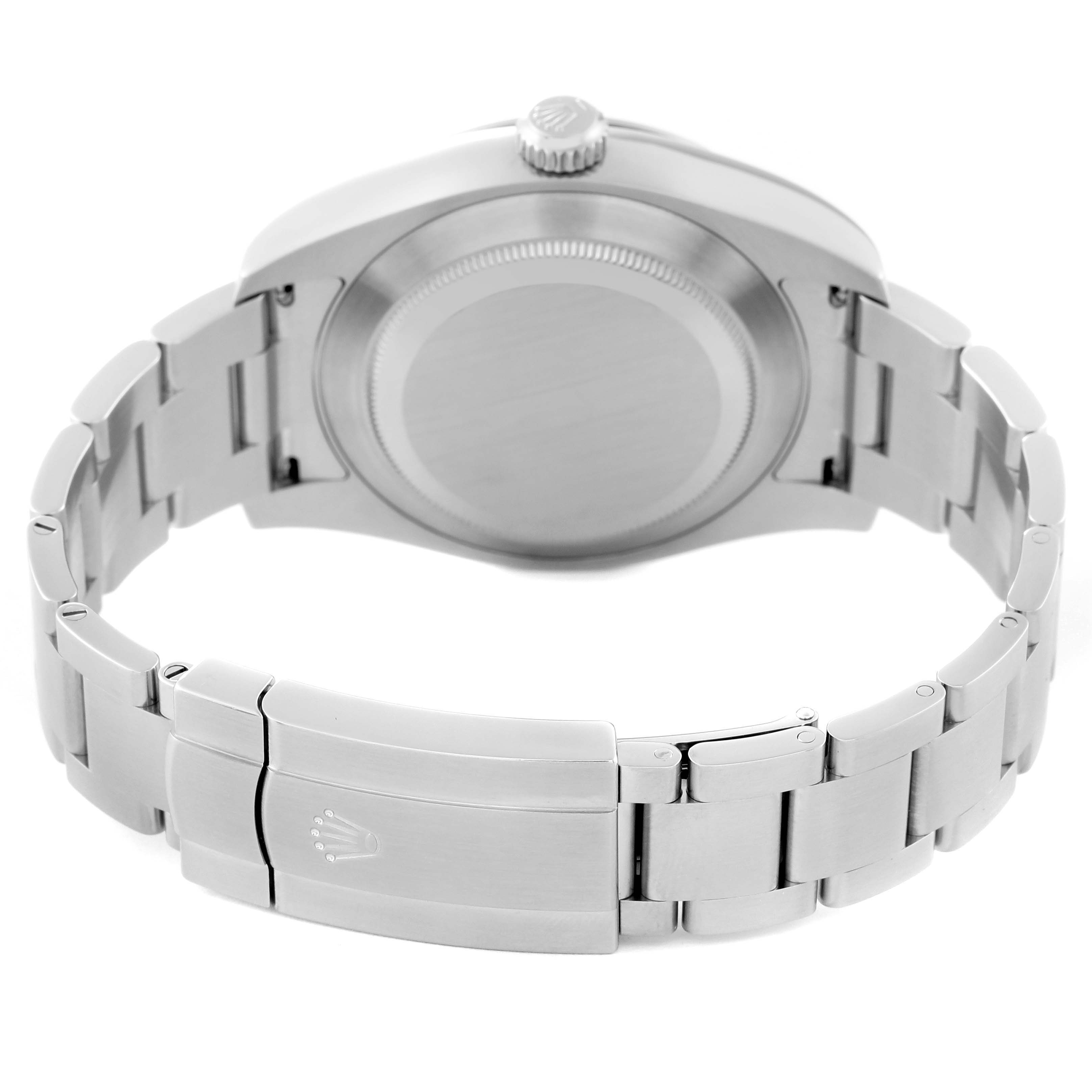 This image shows the back view of a Rolex Air-King 116900 Men's Stainless Steel Black Dial 116900 Men's Stainless Steel Black Dial watch, highlighting its case, crown, and metal bracelet.