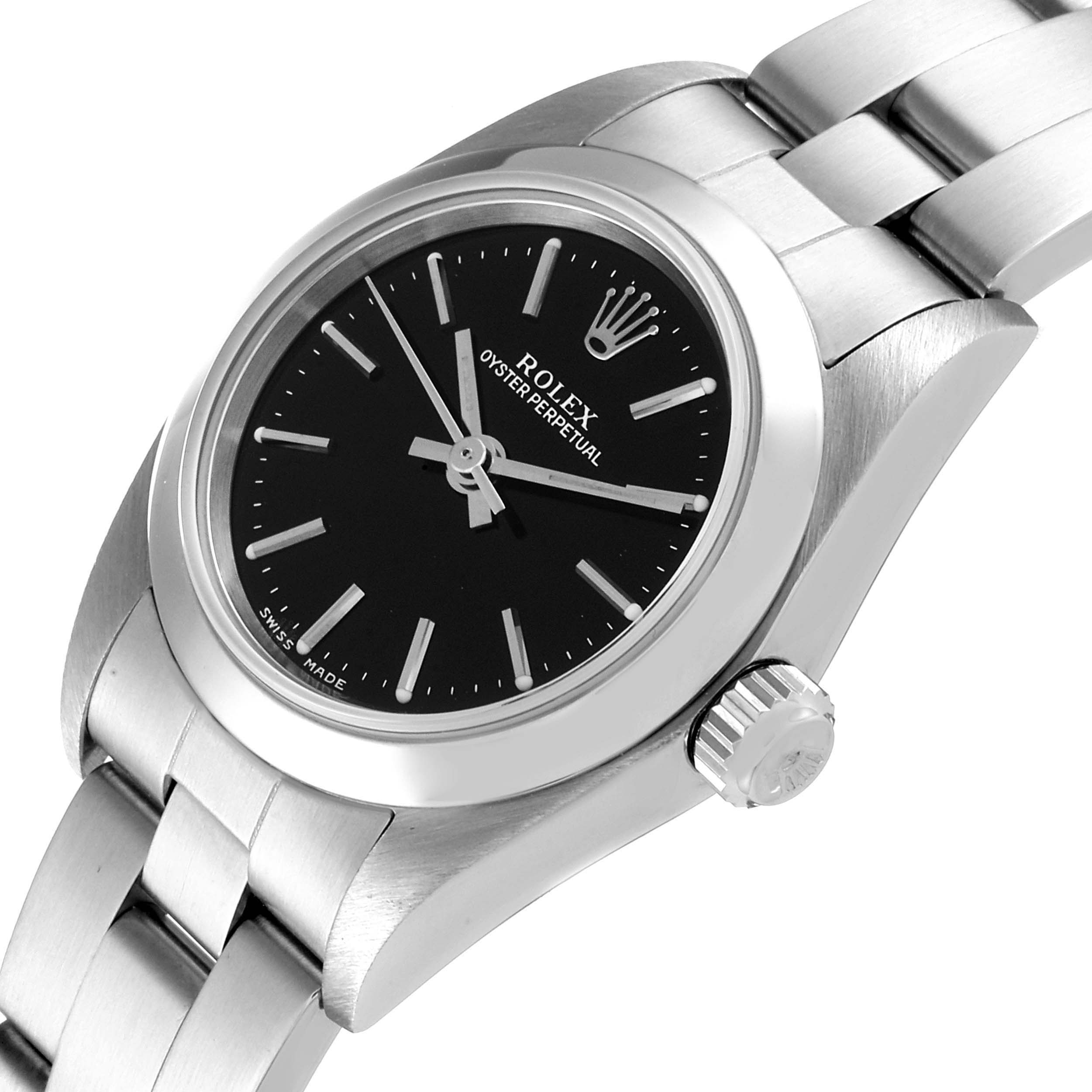 The image shows a close-up, angled view of a Rolex Oyster Perpetual 76080 Women's Stainless Steel Black Dial 76080 Women's Stainless Steel Black Dial watch, highlighting the dial, crown, and bracelet.