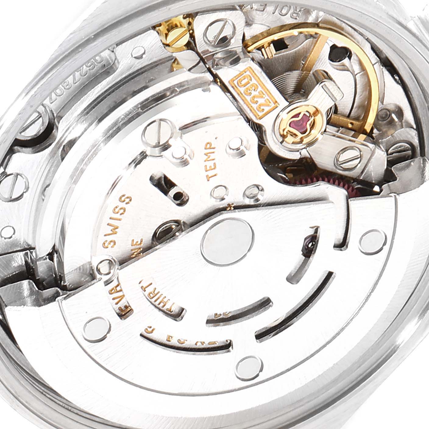 This image shows a close-up view of the movement mechanism inside a Rolex Oyster Perpetual 76080 Women's Stainless Steel Black Dial 76080 Women's Stainless Steel Black Dial watch.