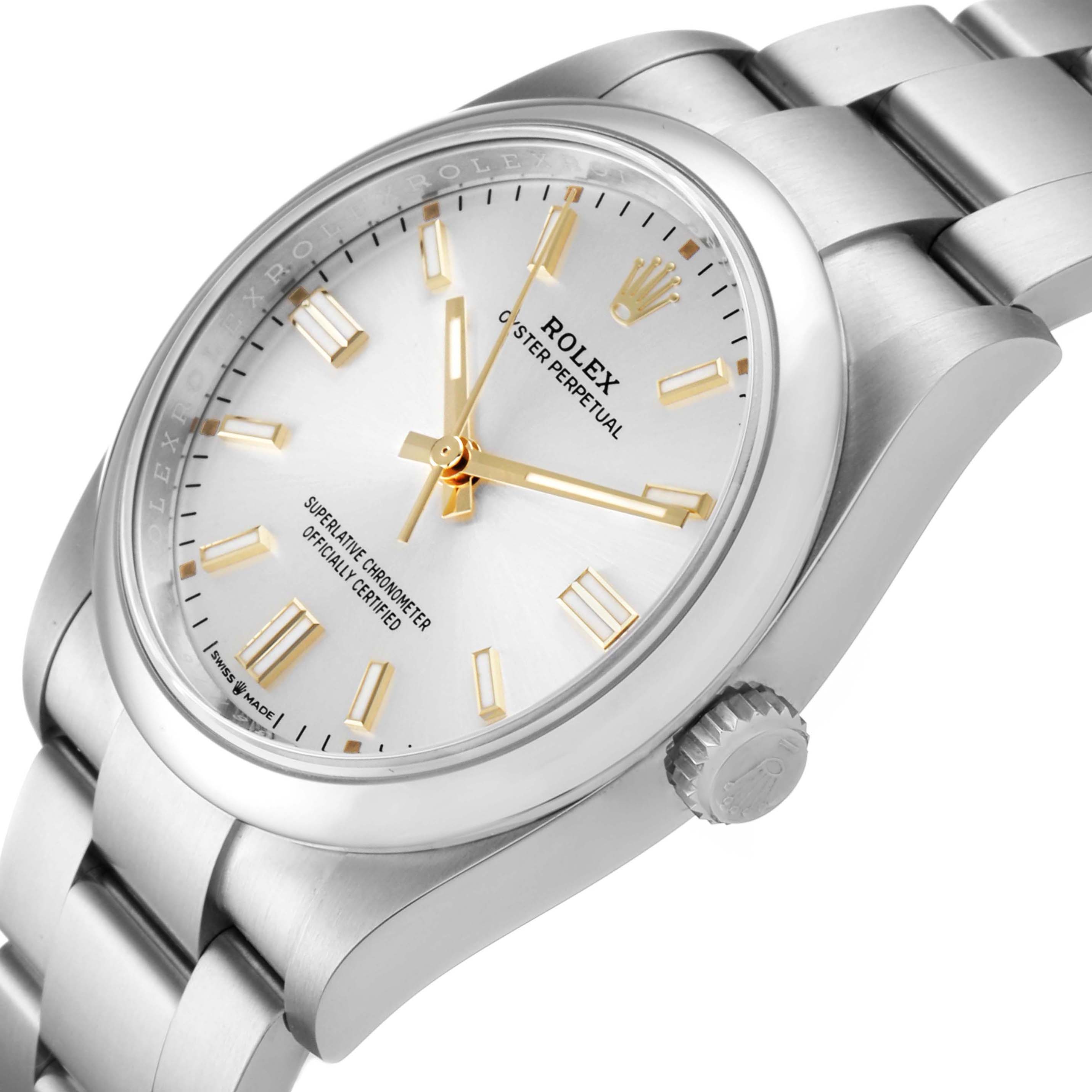This is a close-up angle showing the dial, crown, and part of the bracelet of the Rolex Oyster Perpetual 126000 Men's Stainless Steel Silver Dial 126000 Men's Stainless Steel Silver Dial watch.