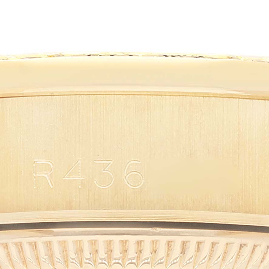 This close-up image shows the engraved serial number on the case back of the Rolex President 69158 Women
s Yellow Gold Champagne Dial 69158 Women
s Yellow Gold Champagne Dial model.