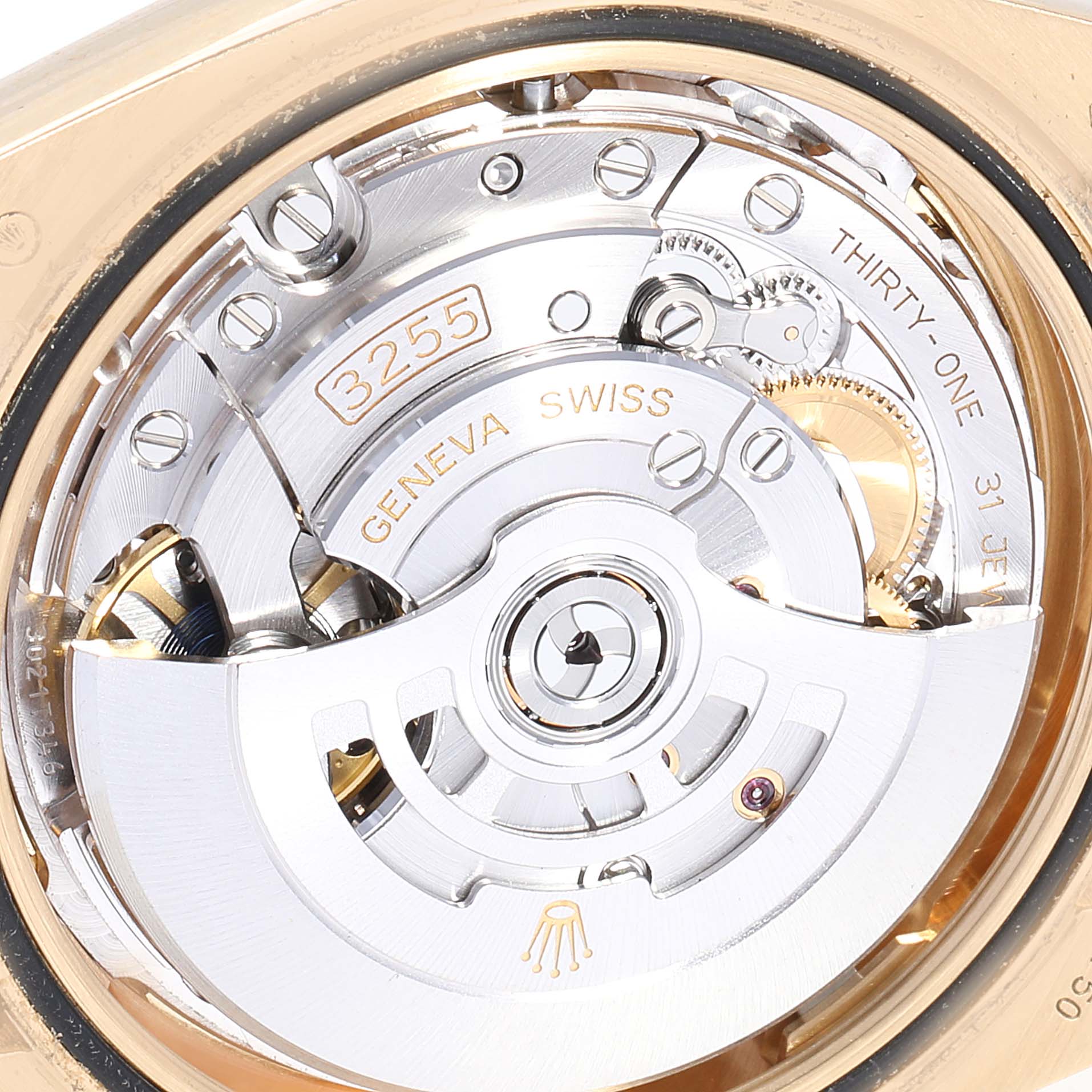 The image shows a close-up of the Rolex President 228238 Men's Yellow Gold Champagne Dial 228238 Men's Yellow Gold Champagne Dial model's movement, showcasing its intricate inner mechanism.