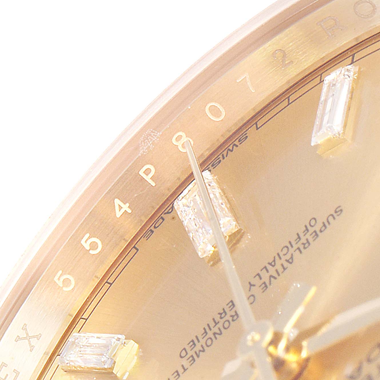 The image shows the dial and part of the bezel of a Rolex President 228238 Men's Yellow Gold Champagne Dial 228238 Men's Yellow Gold Champagne Dial model watch at a close-up angle, highlighting its hour markers and inscriptions.
