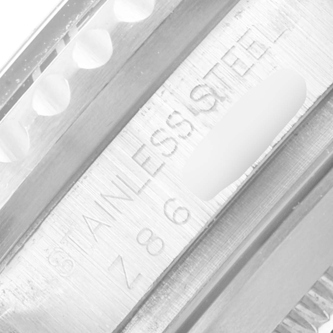 This image shows a close-up angle of the side of the casing for a Rolex Sea-Dweller 16600 Men
s Stainless Steel Black Dial 16600 Men
s Stainless Steel Black Dial watch, highlighting the "STAINLESS STEEL" engraving.