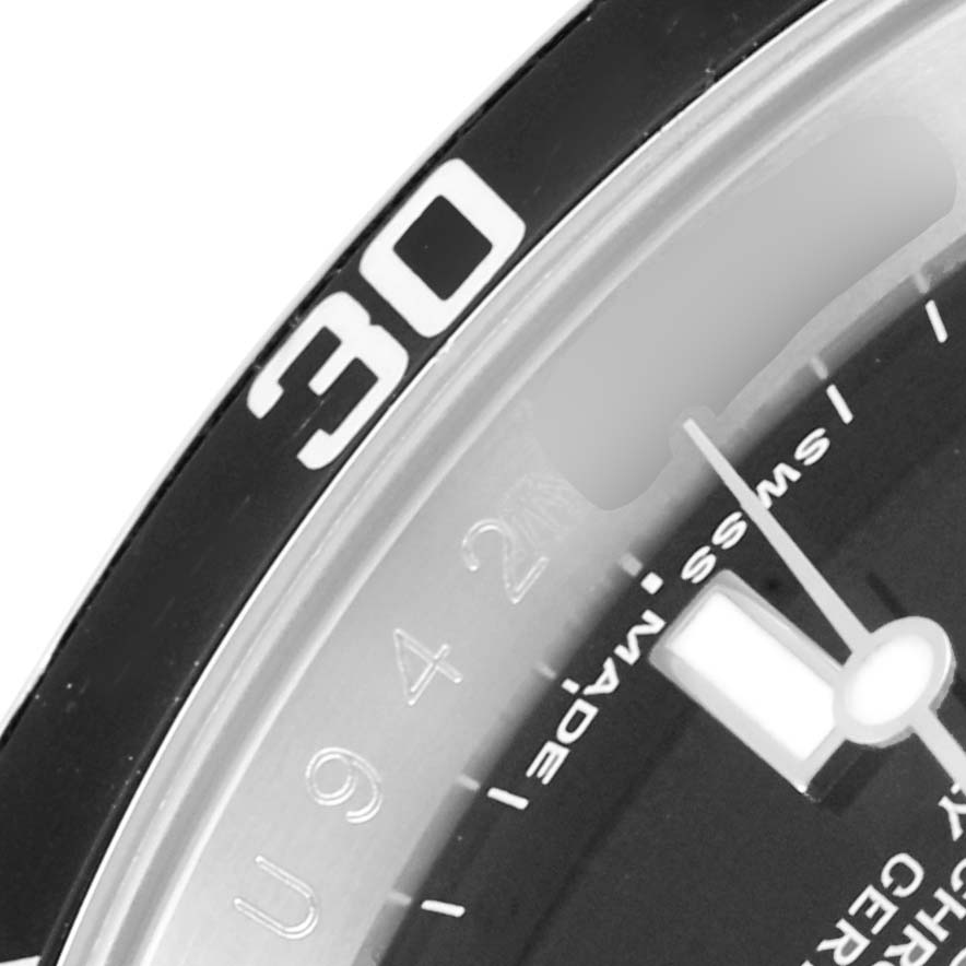 The image shows a close-up of the bezel and part of the dial of a Rolex Submariner 16610 Men
s Stainless Steel Black Dial 16610 Men
s Stainless Steel Black Dial watch.