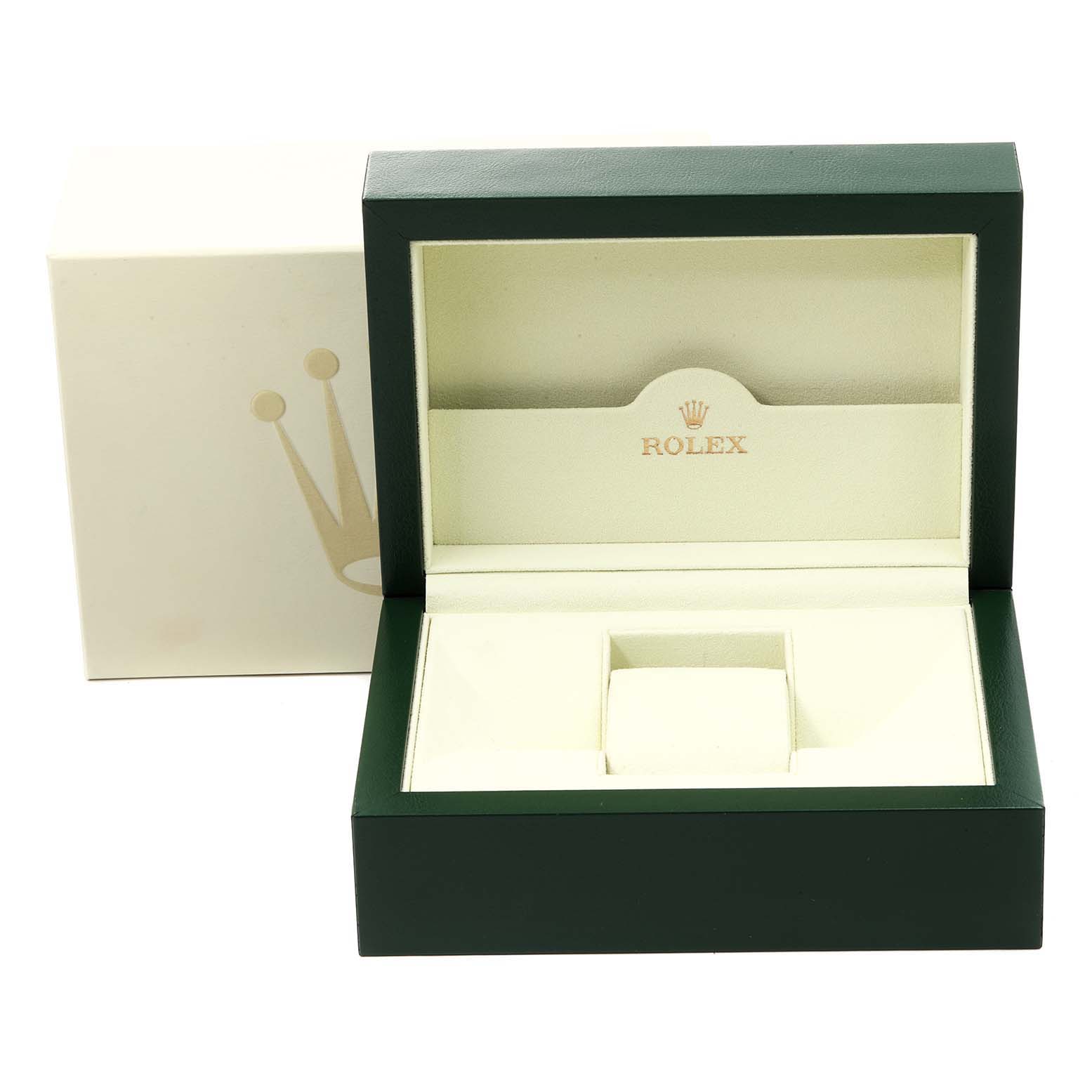 The image shows an open Rolex Submariner 16610 Men
s Stainless Steel Black Dial 16610 Men
s Stainless Steel Black Dial watch box, revealing the interior compartments.