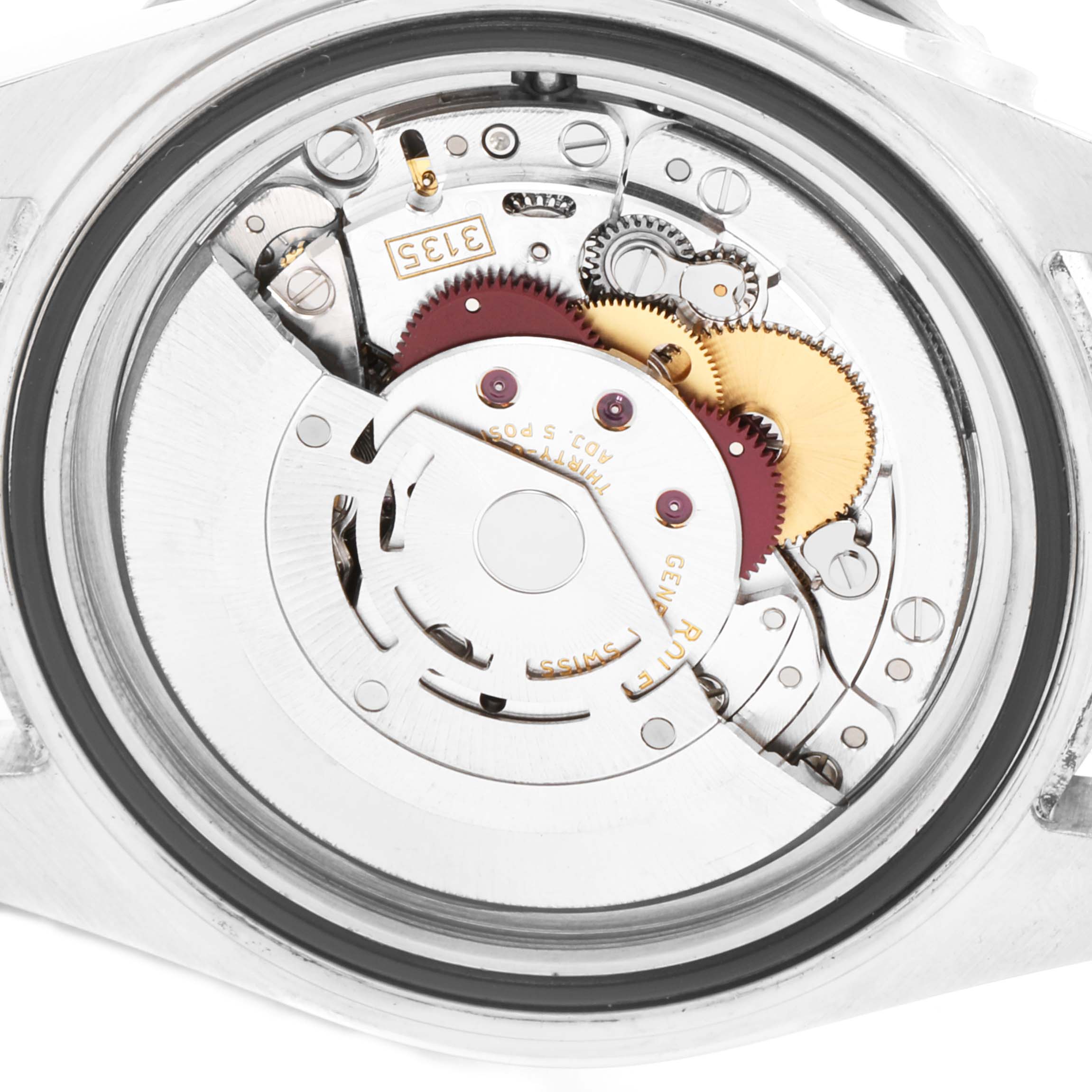 This image shows a close-up view of the interior mechanics and movement of a Rolex Submariner 16610 Men
s Stainless Steel Black Dial 16610 Men
s Stainless Steel Black Dial watch.