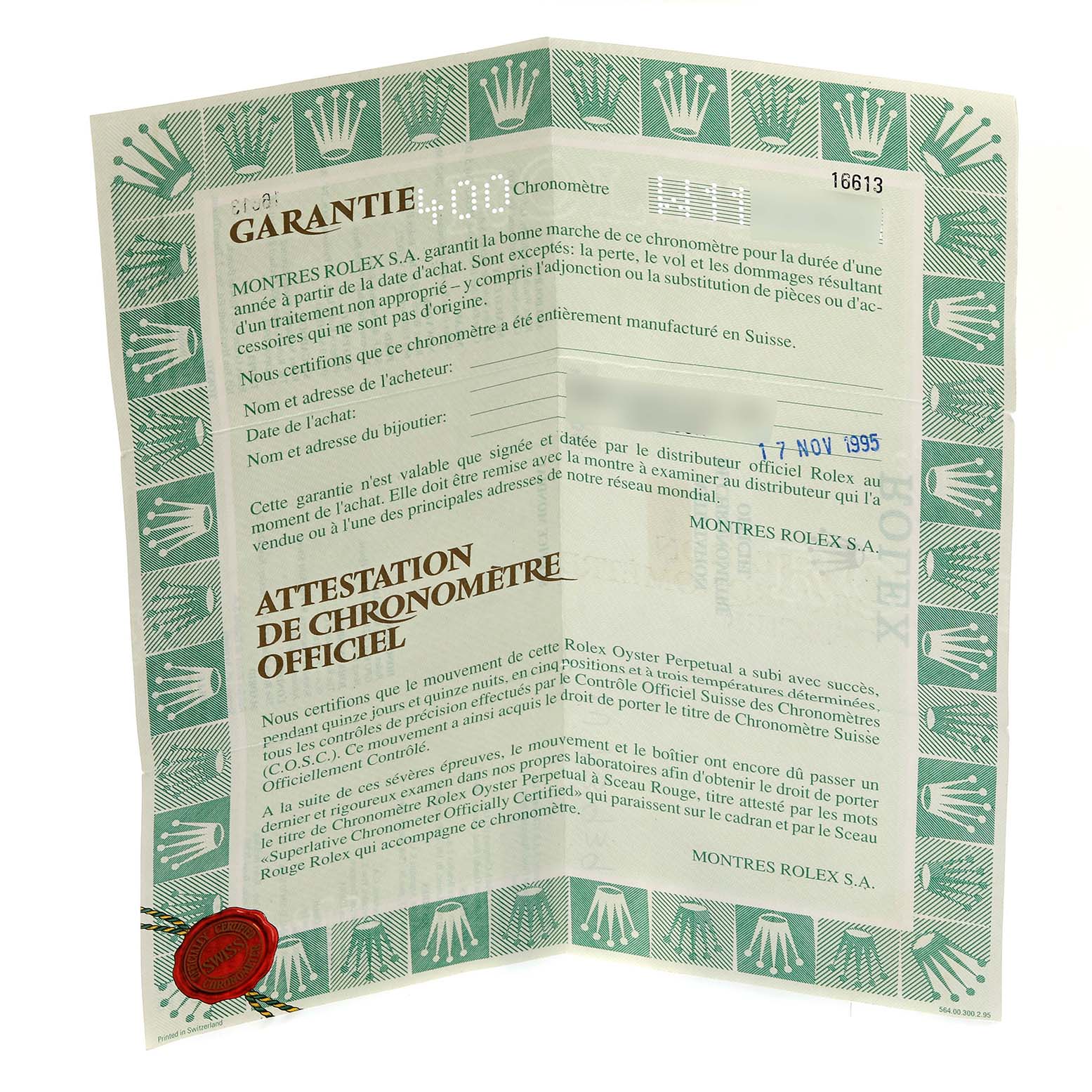 This image shows the warranty certificate and chronometer certification for the Rolex Submariner 16613 Men's Steel and Gold (two tone) Blue Dial 16613 Men's Steel and Gold (two tone) Blue Dial model.