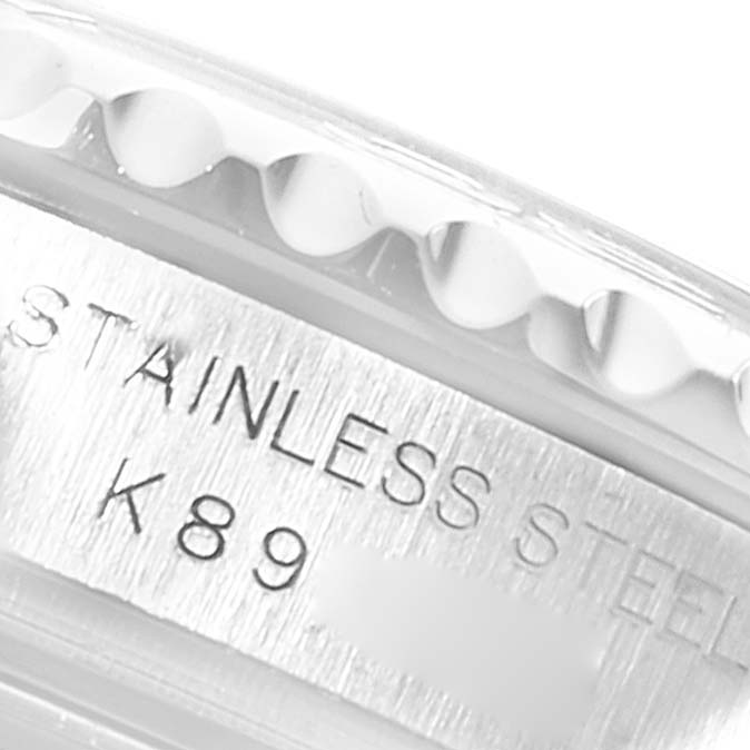 The image shows a close-up angle of the Rolex Yacht-Master 169622 Women's Stainless Steel Silver Dial 169622 Women's Stainless Steel Silver Dial watch's stainless steel case with engraved details.