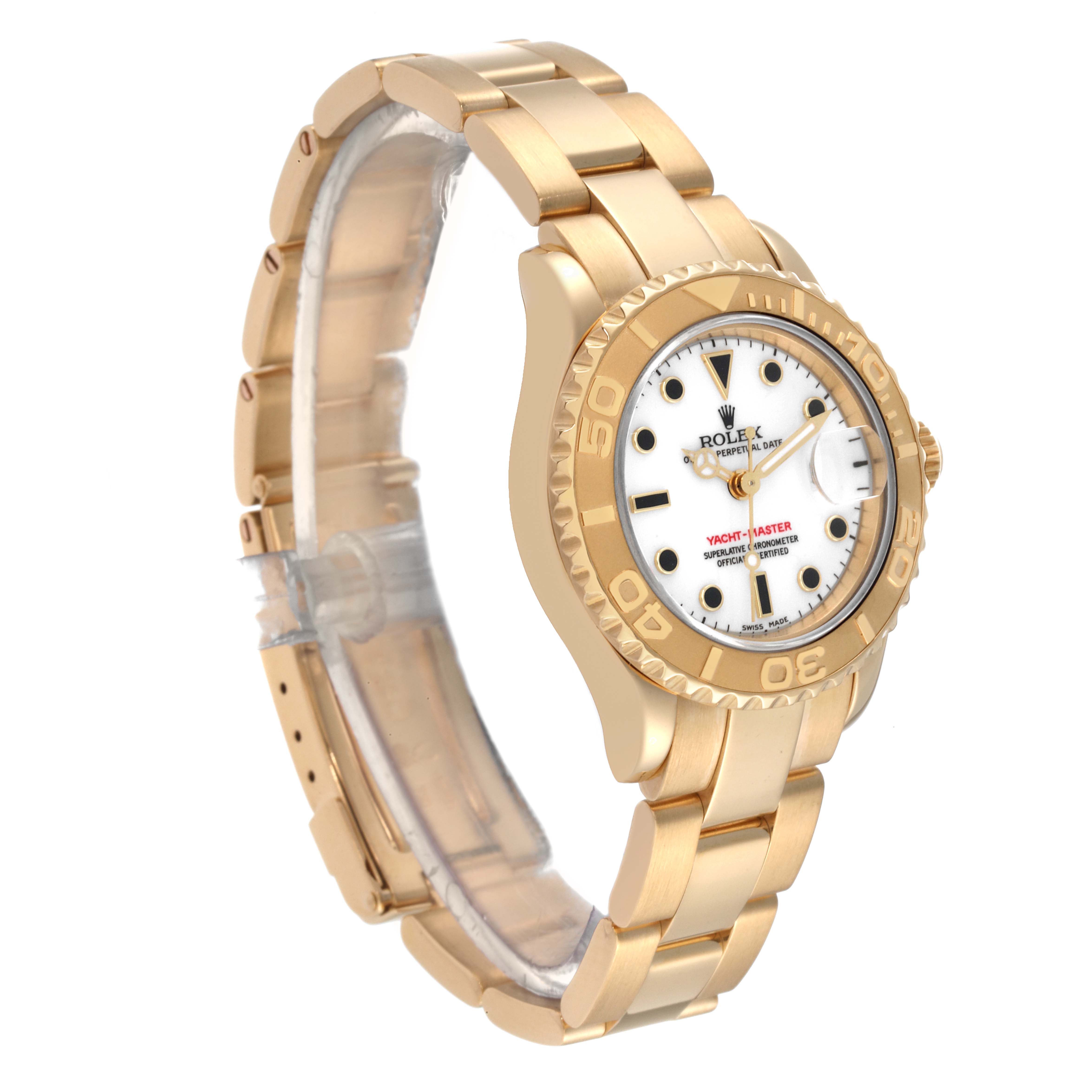 The Rolex Yacht-Master 69628 Women's Yellow Gold White Dial 69628 Women's Yellow Gold White Dial watch is shown at a tilted angle, highlighting its gold bracelet, bezel, and white dial.