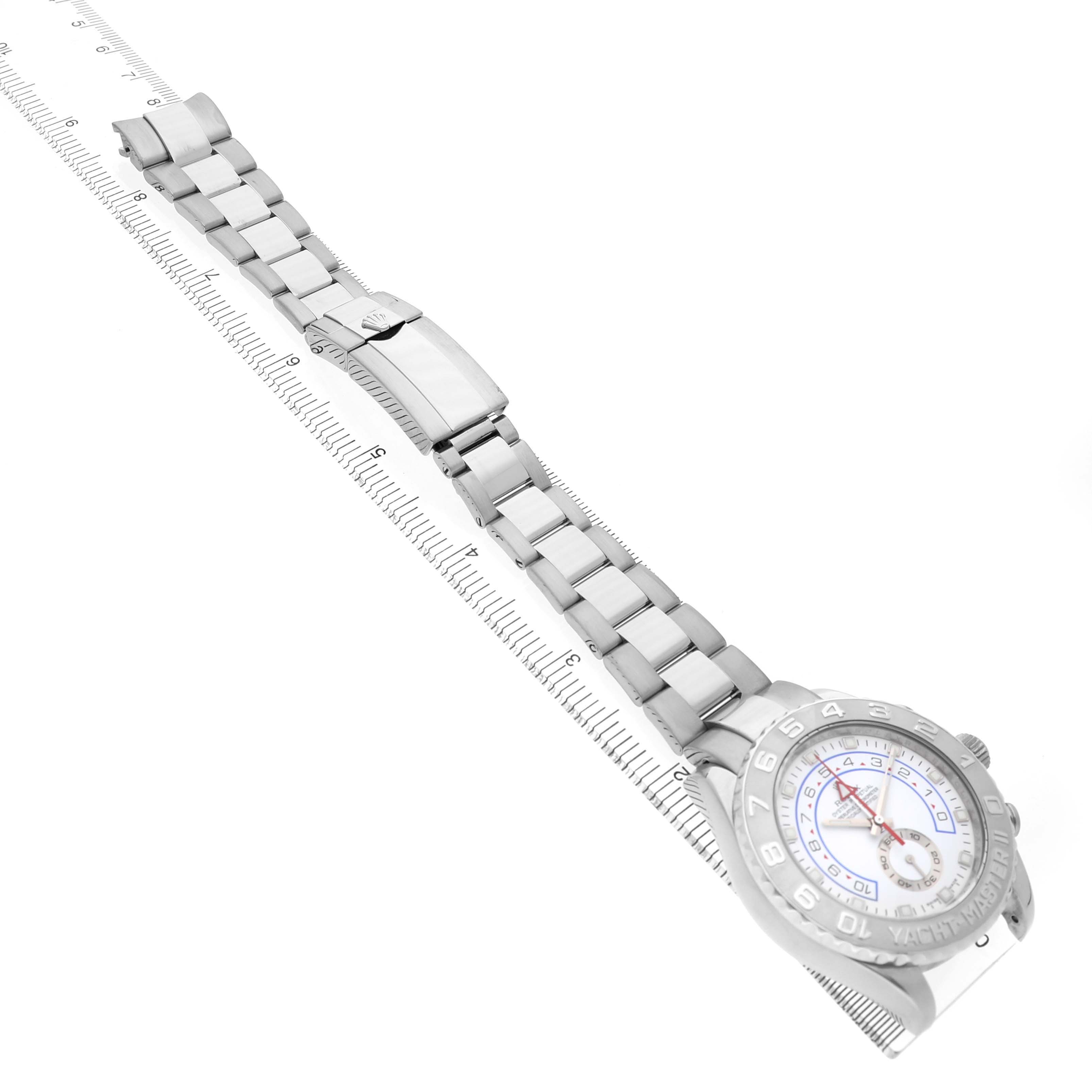 The Rolex Yacht-Master 116689 Men's White Gold White Dial watch is shown from an angled top view, displaying its face, bezel, bracelet, and clasp.