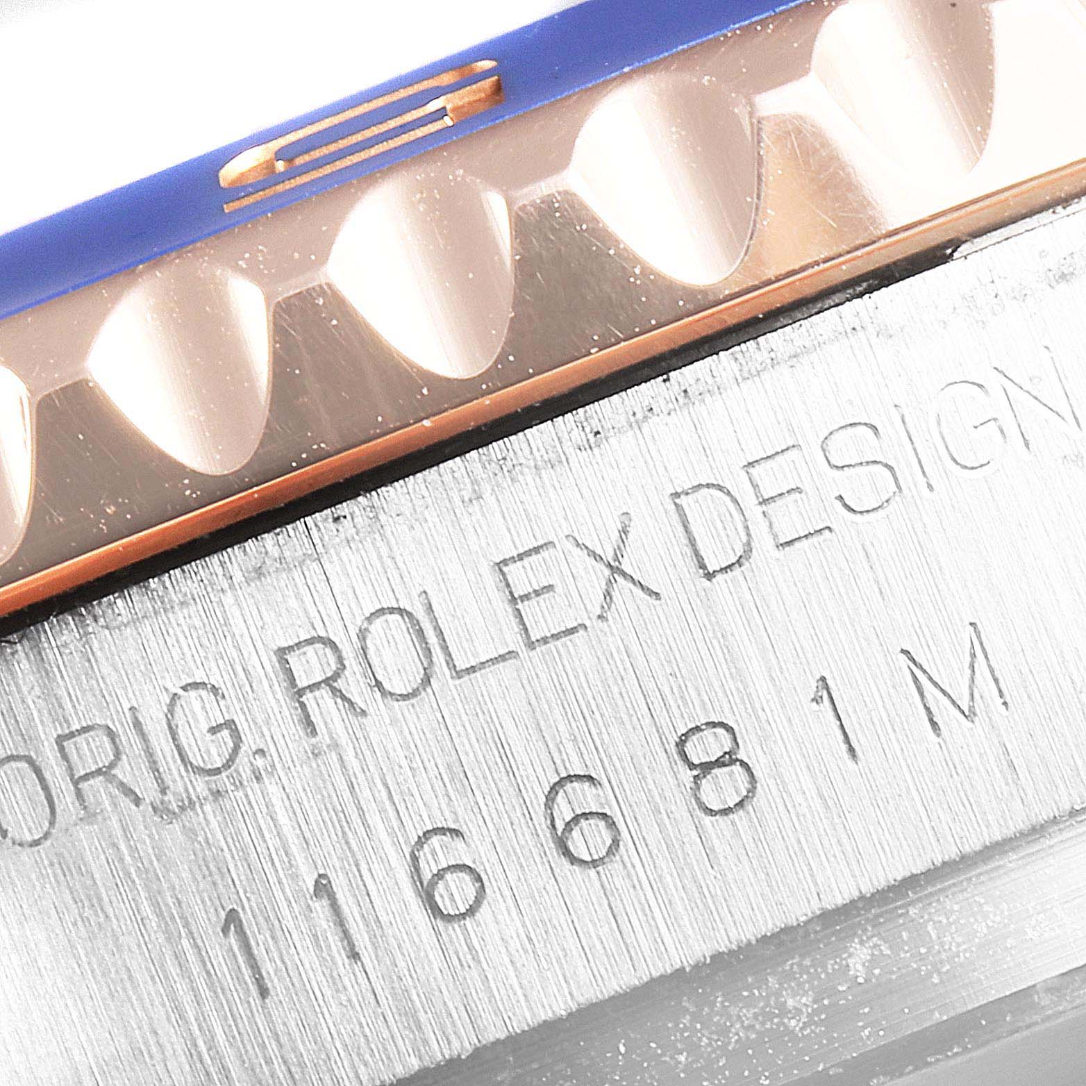 Close-up of the Rolex Yacht-Master 116681 Men's Steel and Gold (two tone) White Dial 116681 Men's Steel and Gold (two tone) White Dial watch showing the bezel and engraved side with model number 116681.