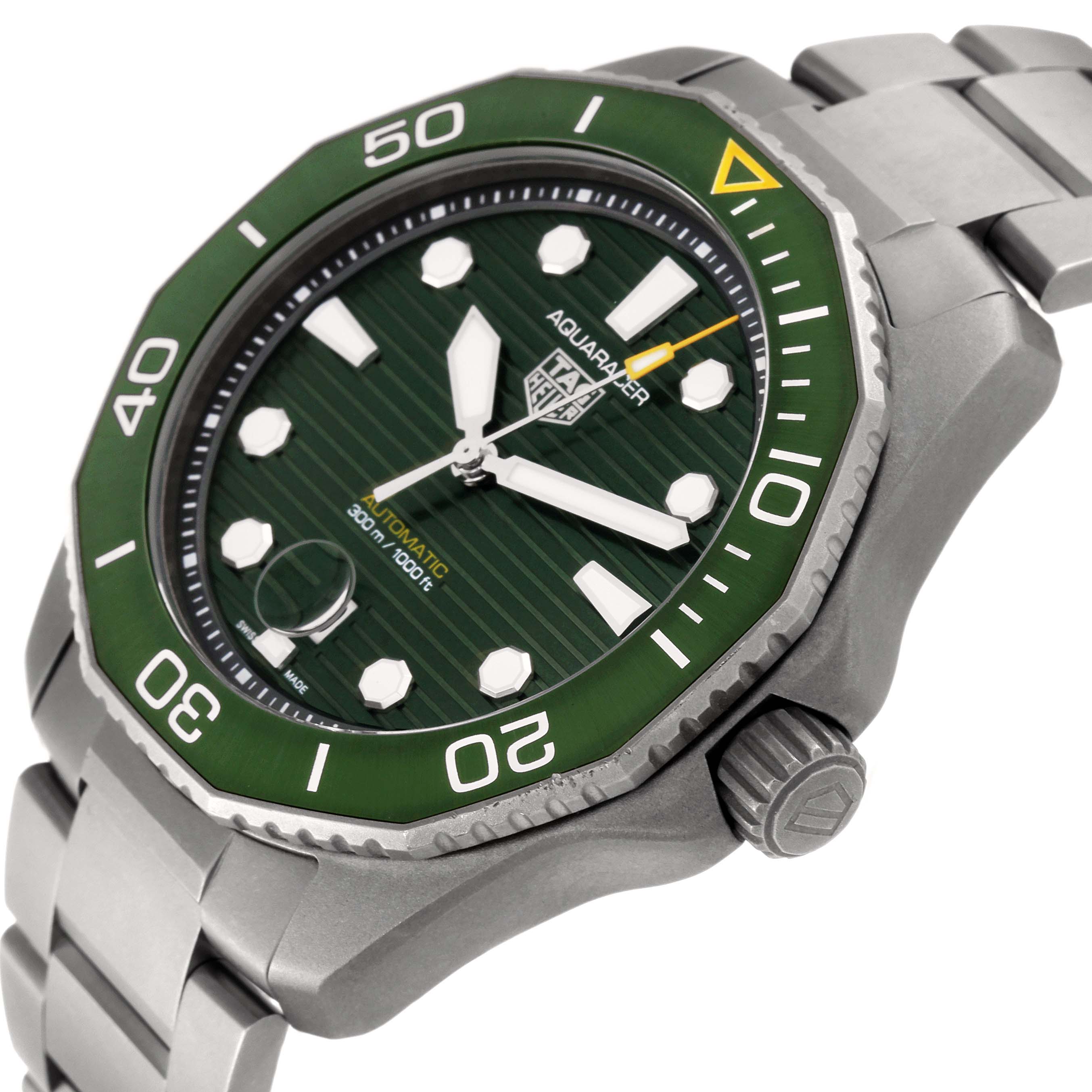The Tag Heuer Aquaracer WBP208B.BF0631 Men's Titanium Green Dial WBP208B.BF0631 Men's Titanium Green Dial watch is shown at an angle highlighting the green dial, bezel, crown, and stainless steel bracelet.