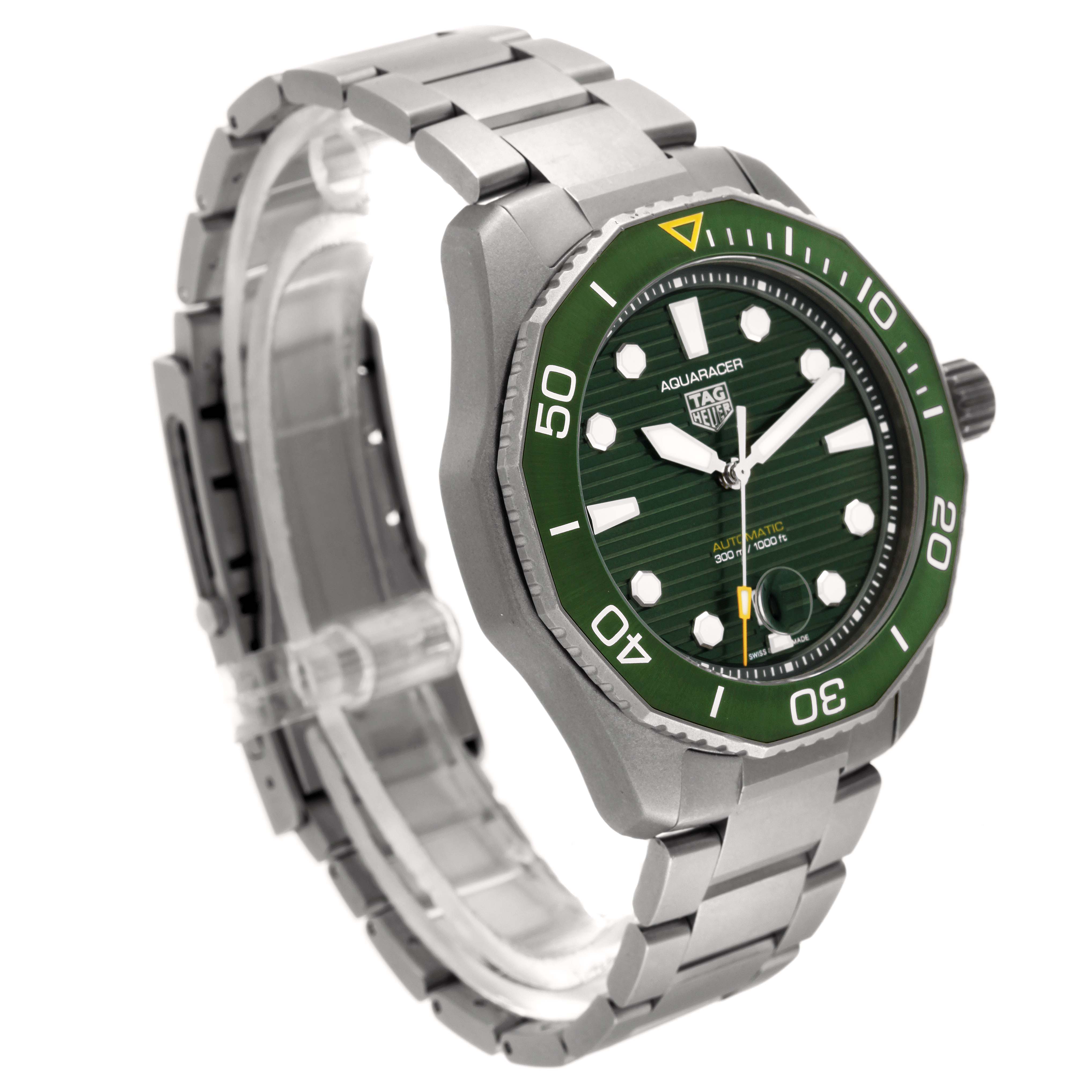 This image shows a Tag Heuer Aquaracer WBP208B.BF0631 Men's Titanium Green Dial WBP208B.BF0631 Men's Titanium Green Dial watch from a three-quarter angle, highlighting the watch face, bezel, and metal strap.