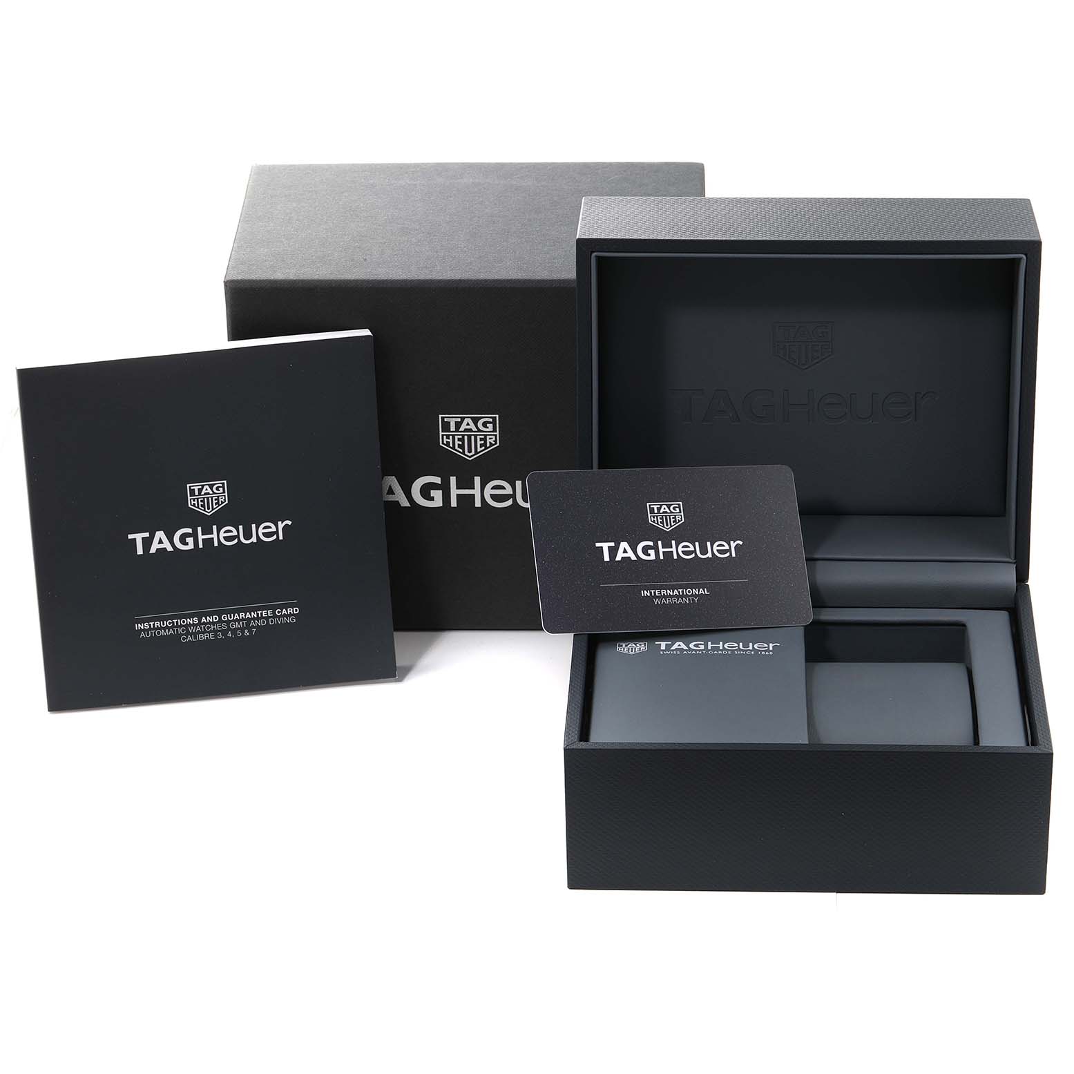 The image shows the packaging, instruction manual, and warranty card for the Tag Heuer Aquaracer WBP208B.BF0631 Men's Titanium Green Dial WBP208B.BF0631 Men's Titanium Green Dial watch.