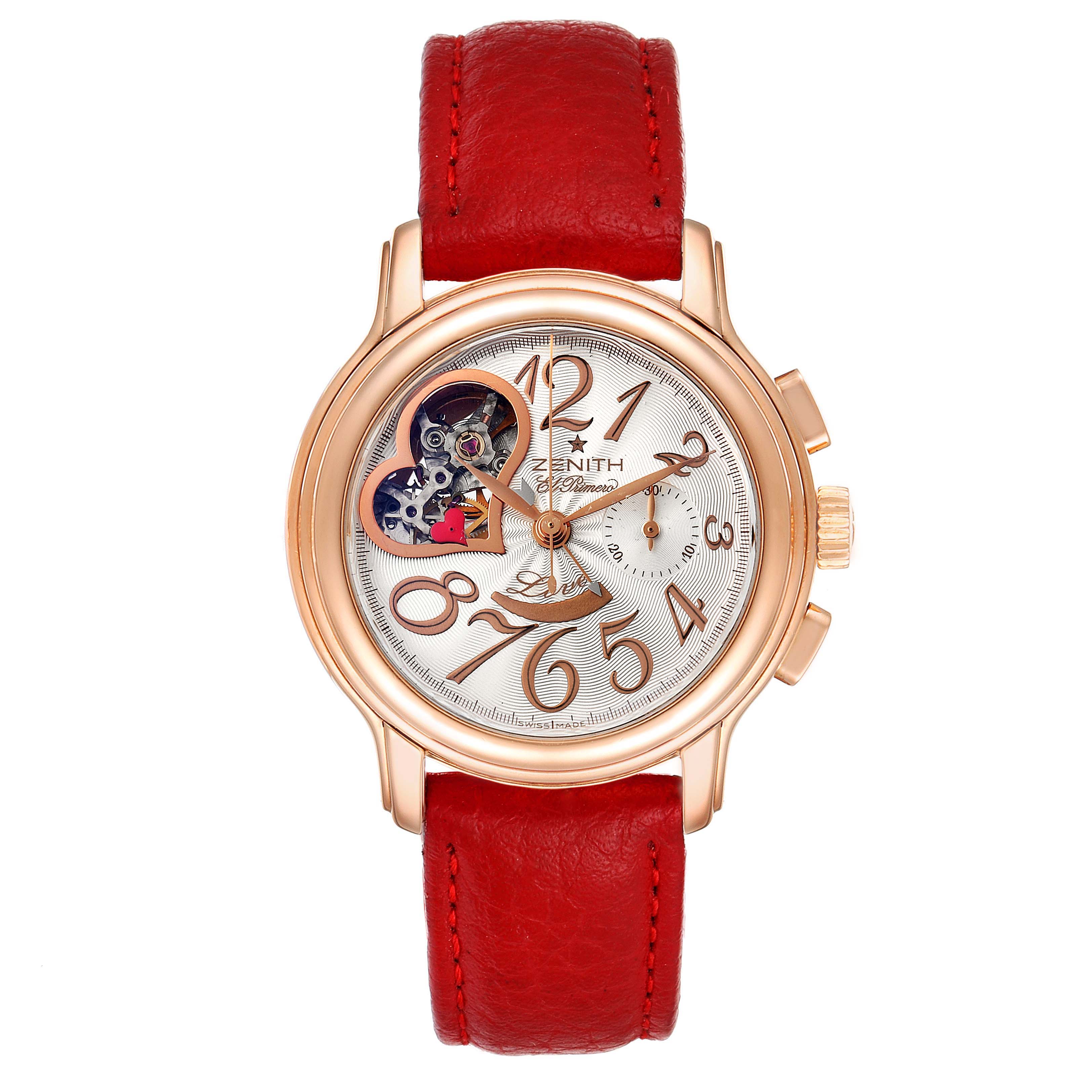 The Zenith 18.1230.4021/01.C588 Women's Rose Gold Silver Dial 18.1230.4021/01.C588 Women's Rose Gold Silver Dial El Primero Open Heart Rose Gold Chronograph Watch 18.1230.4021 is shown from a front view displaying its red strap and open heart dial.
