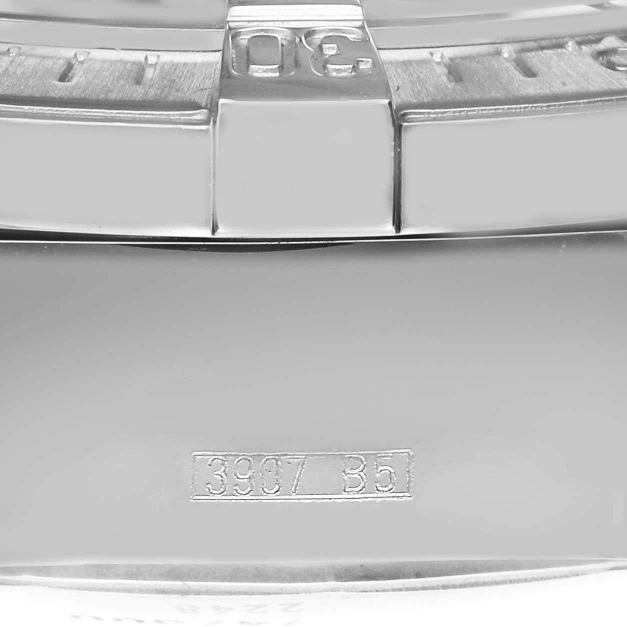 The image shows a close-up side view of the bezel and serial number of a Breitling Superocean A13340 Men's Stainless Steel Grey Dial A13340 Men's Stainless Steel Grey Dial watch.