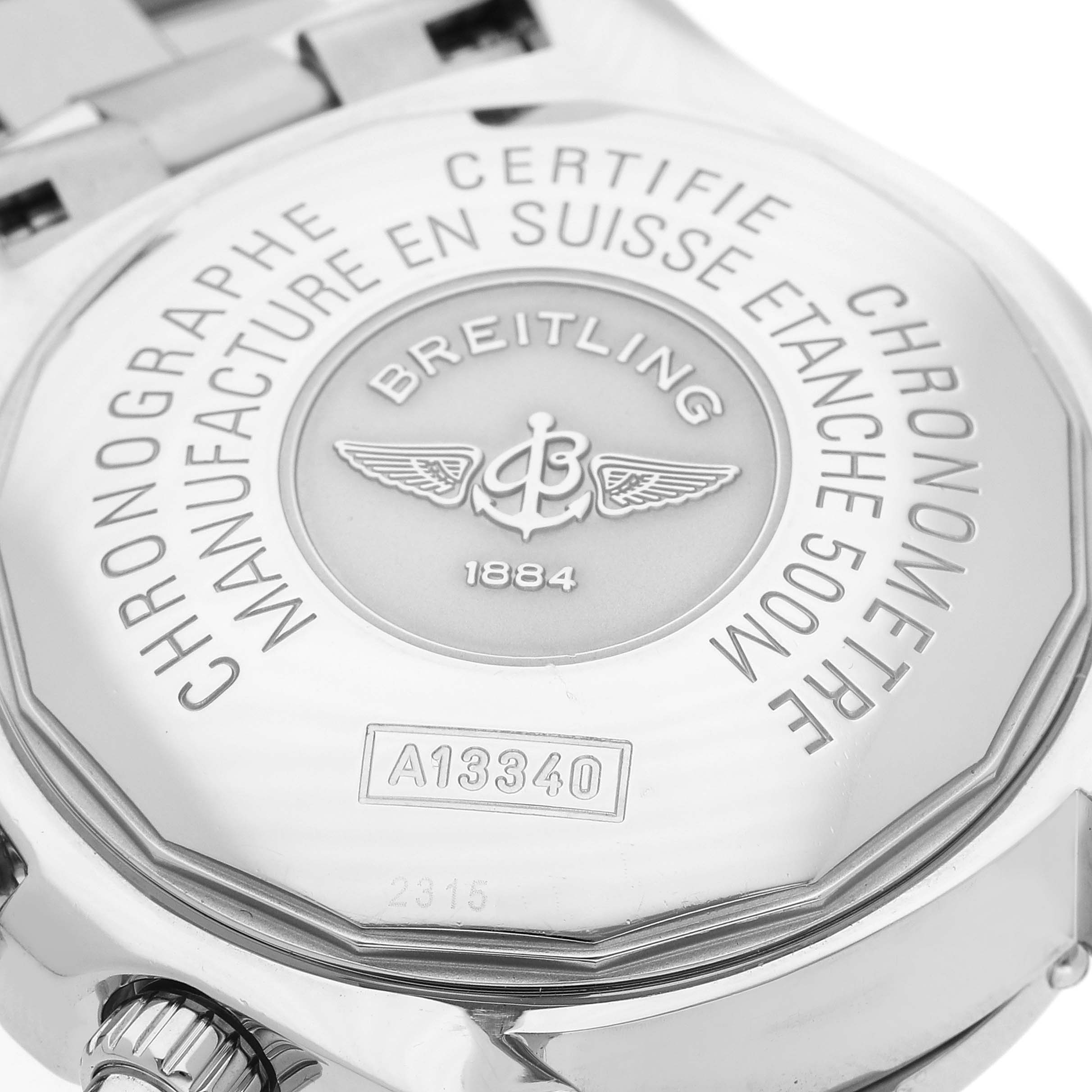 The image shows the back casing of a Breitling Superocean A13340 Men's Stainless Steel Grey Dial A13340 Men's Stainless Steel Grey Dial watch, highlighting engravings and branding details.