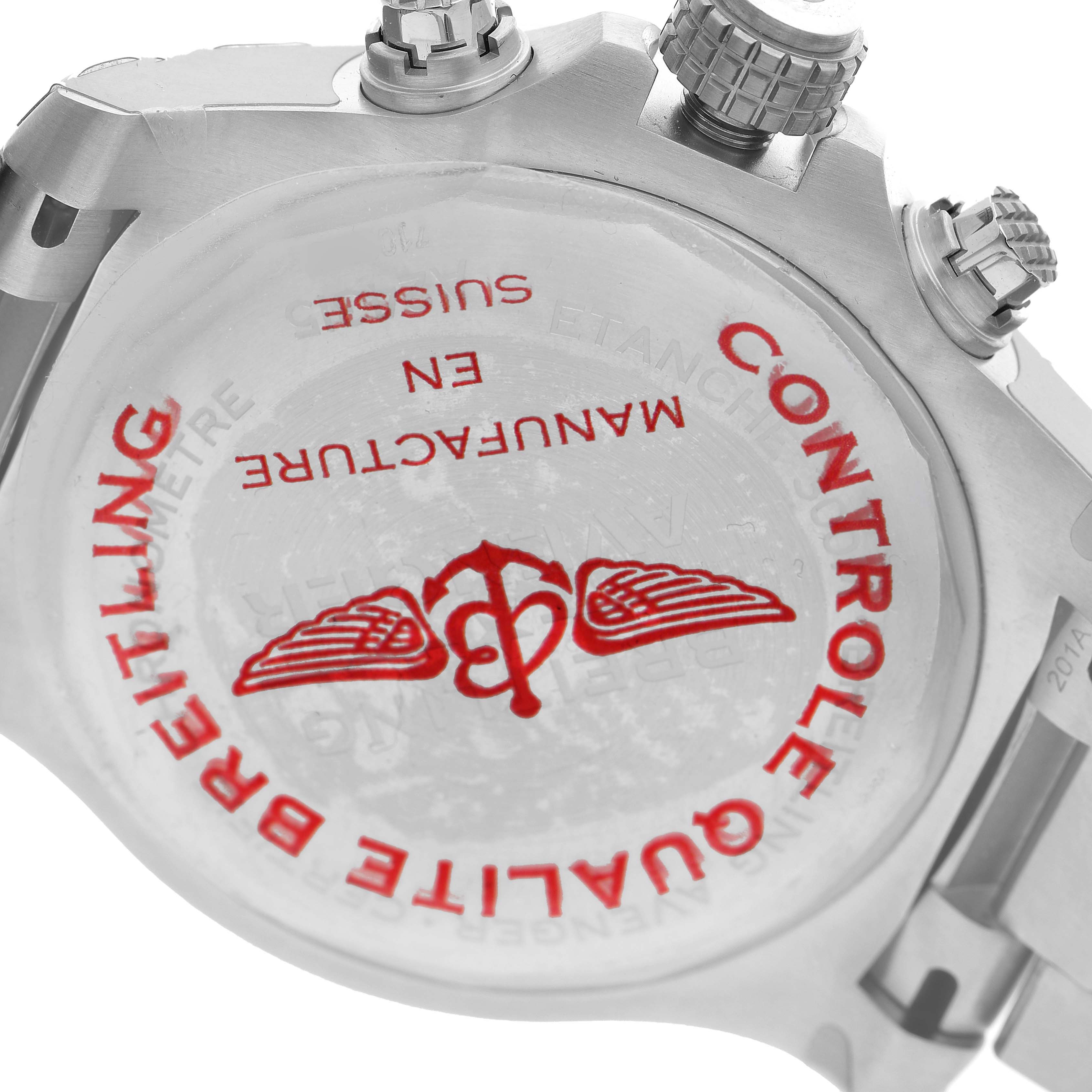 The image shows the back case and crown of the Breitling Avenger A24315101C1A1 Men's Stainless Steel Blue Dial watch, focusing on the engraved details.