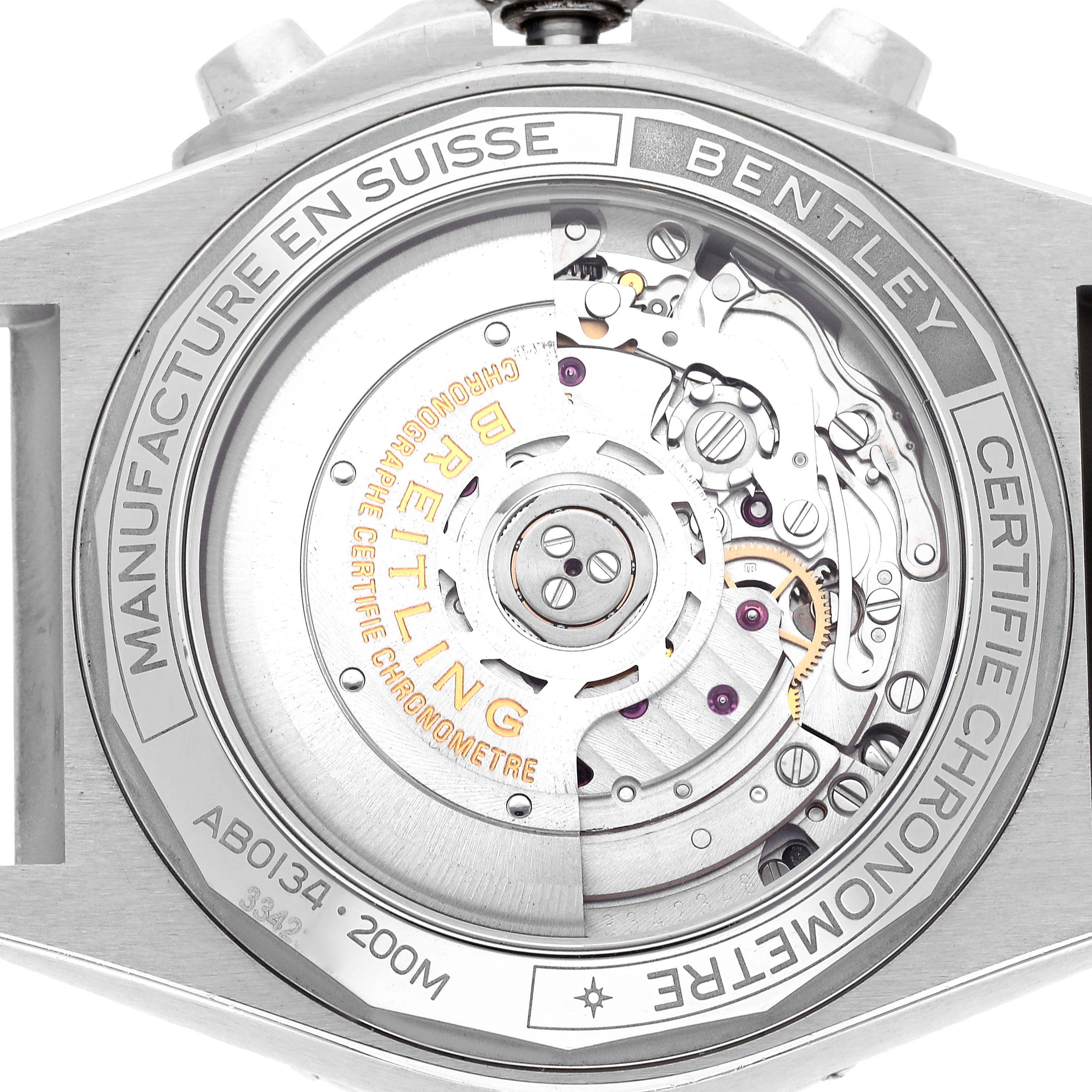 This image shows the back of a Breitling Chronomat AB01343A1L1A1 Men
s Stainless Steel Green Dial AB01343A1L1A1 Men
s Stainless Steel Green Dial watch, exposing its intricate internal movement and engravings.