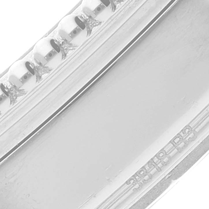 This close-up image shows the detailed edge and markings of a dial or bezel component of the Breitling Navitimer A17325211C1A1 Men's Stainless Steel Blue Dial A17325211C1A1 Men's Stainless Steel Blue Dial watch.