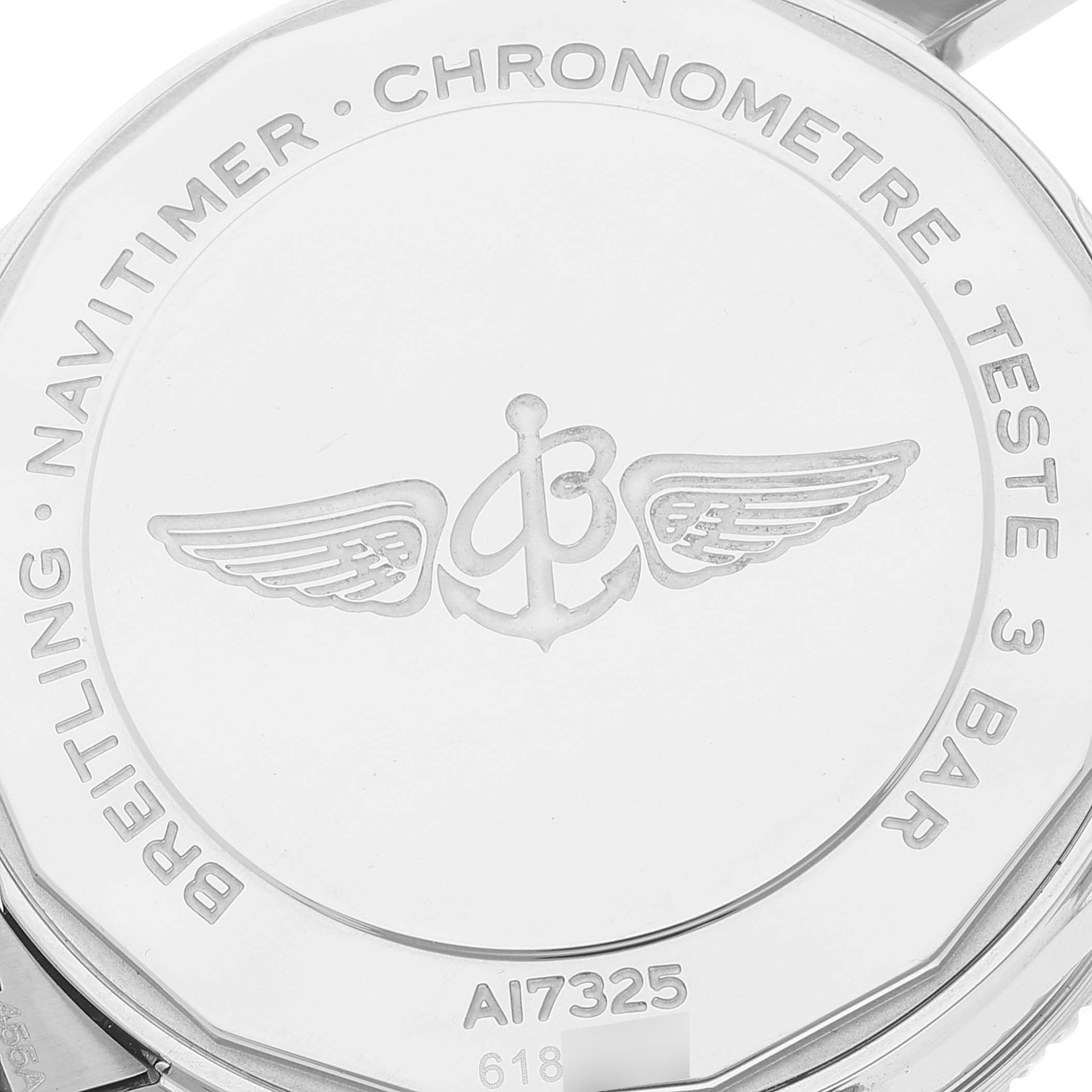 The image shows the case back of a Breitling Navitimer A17325211C1A1 Men's Stainless Steel Blue Dial A17325211C1A1 Men's Stainless Steel Blue Dial watch, highlighting its engravings and emblem.