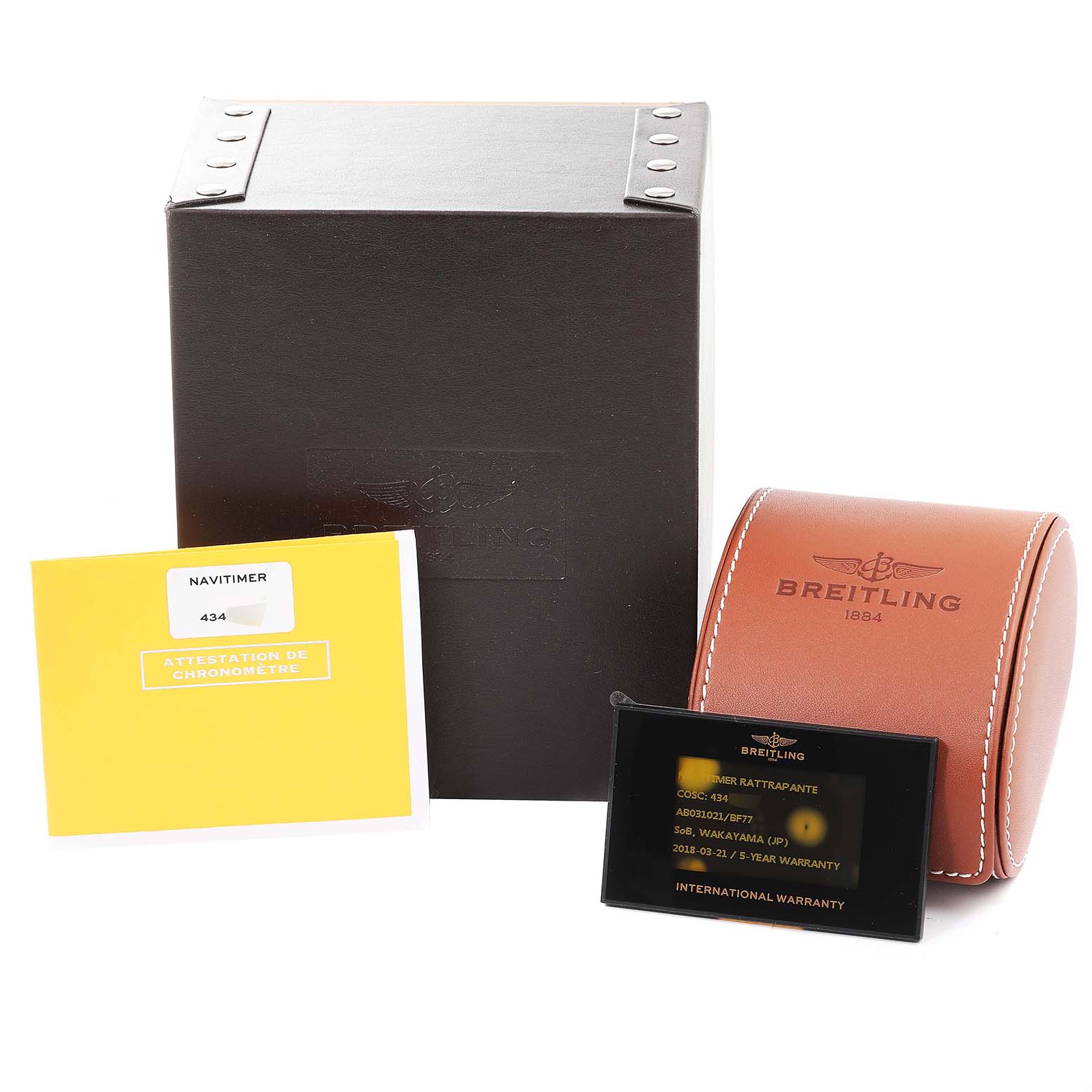 The image shows the Breitling Navitimer AB0310 Men's Stainless Steel Black Dial AB0310 Men's Stainless Steel Black Dial packaging, including a black box, a leather case, and documents from a front angle.