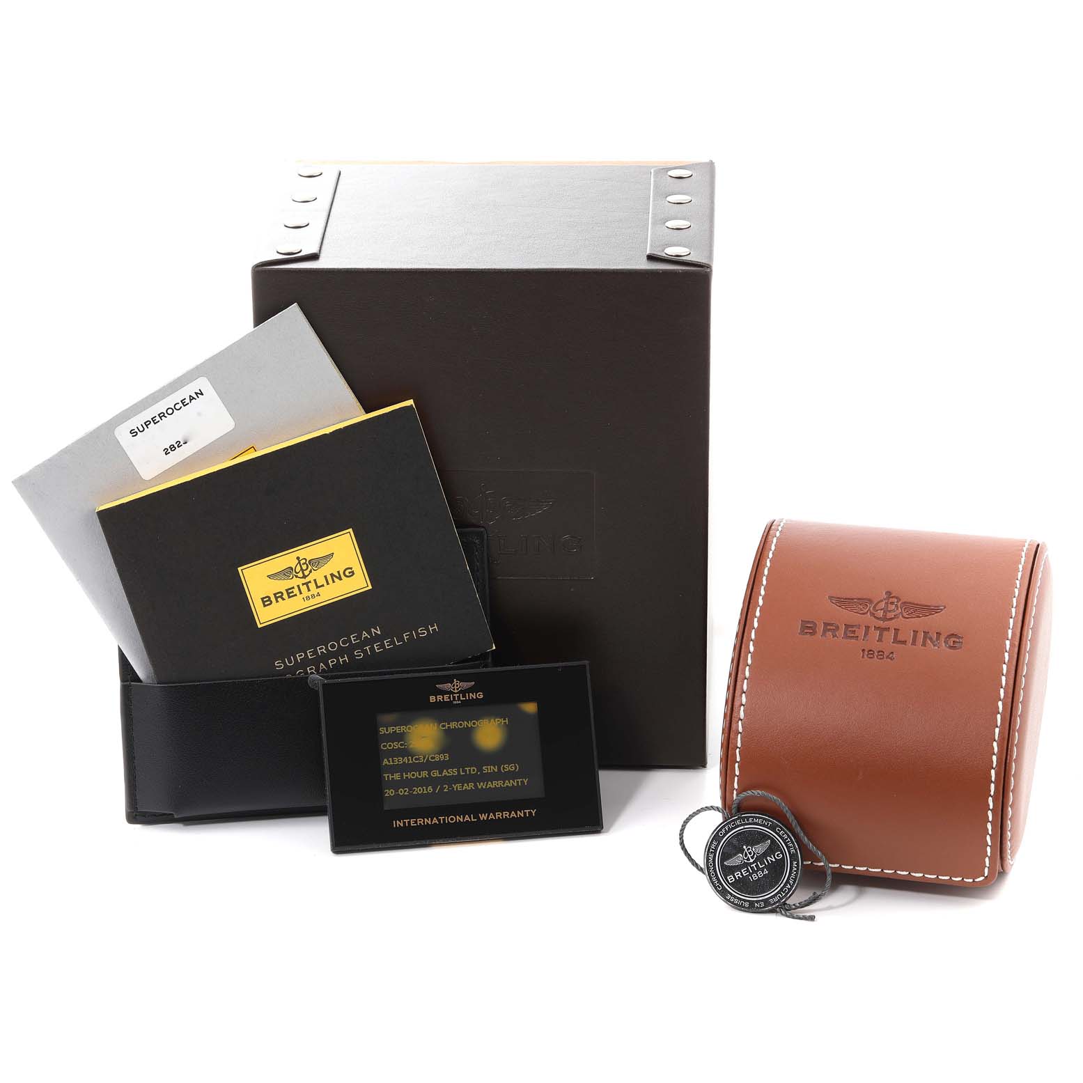 The image shows the packaging, warranty card, manuals, and leather case for the Breitling Superocean A13341 Men's Stainless Steel Blue Dial A13341 Men's Stainless Steel Blue Dial watch model.