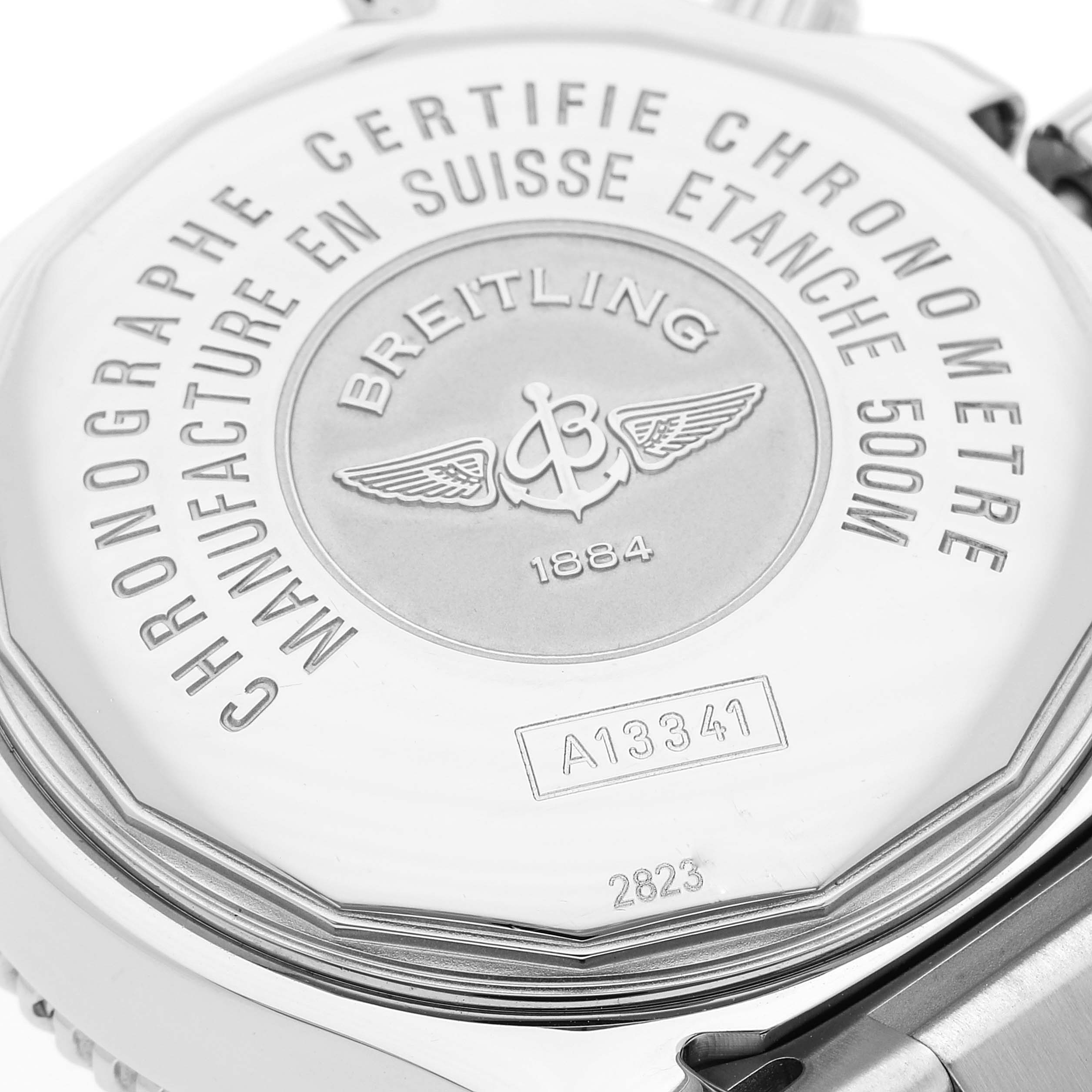 The image shows the engraved case back of a Breitling Superocean A13341 Men's Stainless Steel Blue Dial A13341 Men's Stainless Steel Blue Dial watch, highlighting its certifications and model number.