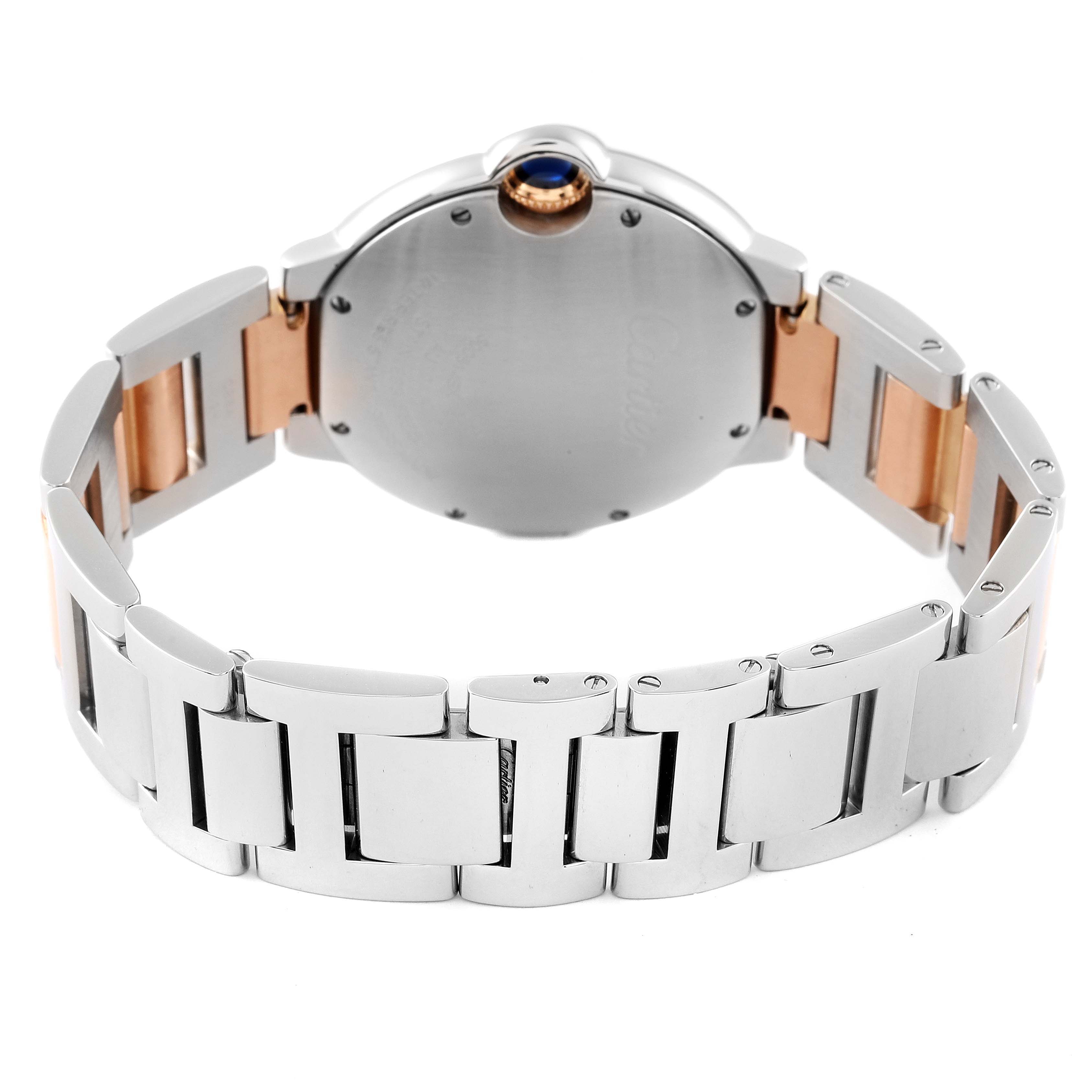 The image shows the back and bracelet of a Ballon Bleu watch by Cartier, highlighting its two-tone metal construction.