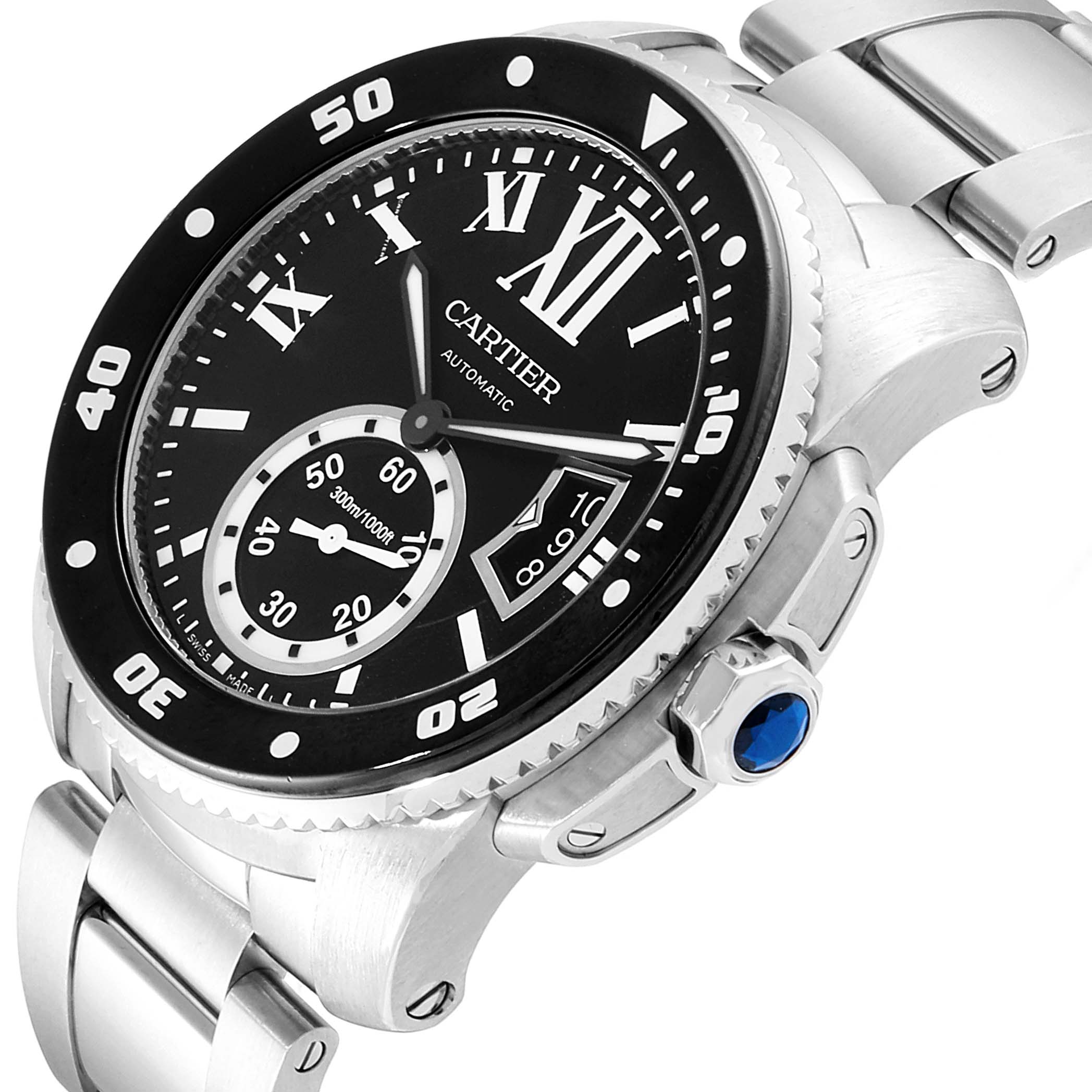 The image shows a close-up view of the dial, bezel, and part of the bracelet of a Calibre de Cartier model by Cartier.