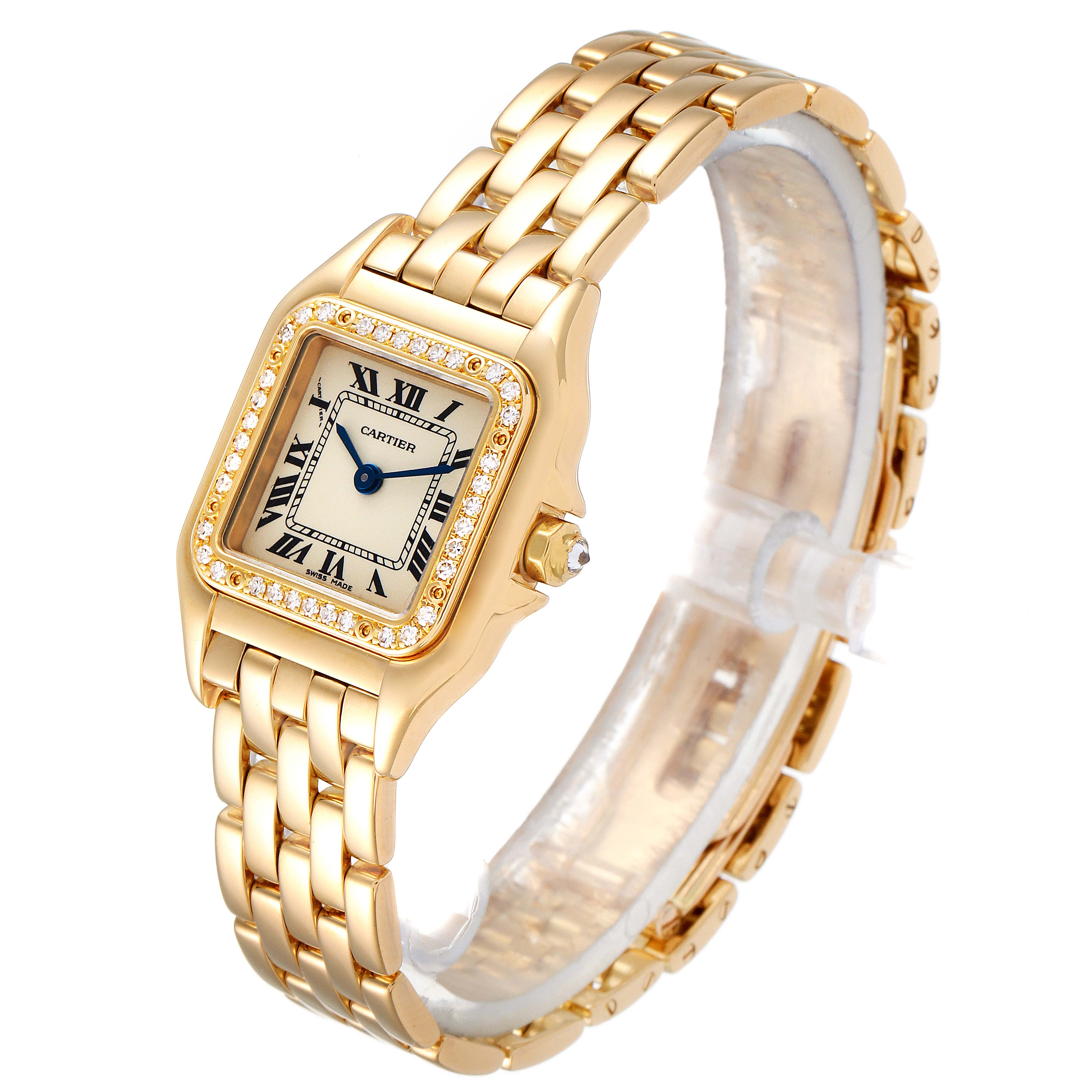 The Cartier Panthere WF3070B9 Women's Yellow Gold Beige Dial WF3070B9 Women's Yellow Gold Beige Dial watch is shown at a three-quarter angle, highlighting its gold bracelet, square dial, and diamond-studded bezel.