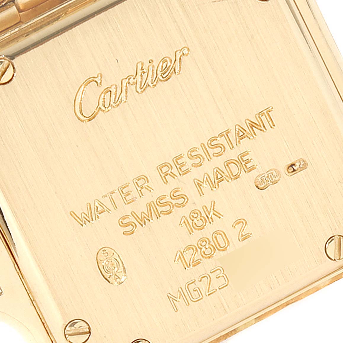 This image shows the case back of the Cartier Panthere WF3070B9 Women's Yellow Gold Beige Dial WF3070B9 Women's Yellow Gold Beige Dial watch with its engraved details.