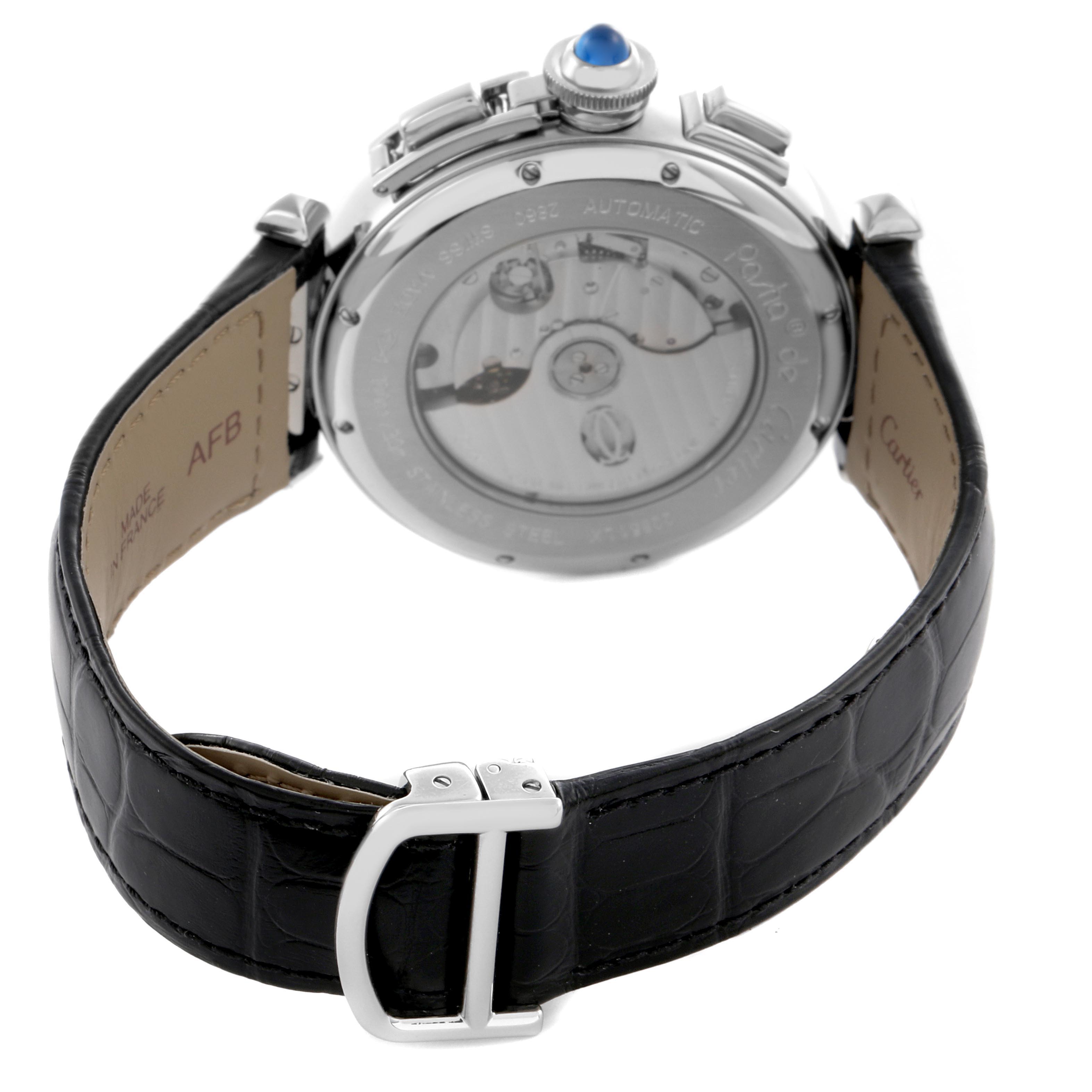 The image shows the back of a Cartier Pasha W3108555 Men's Stainless Steel Silver Dial W3108555 Men's Stainless Steel Silver Dial watch with its leather strap and transparent case back.