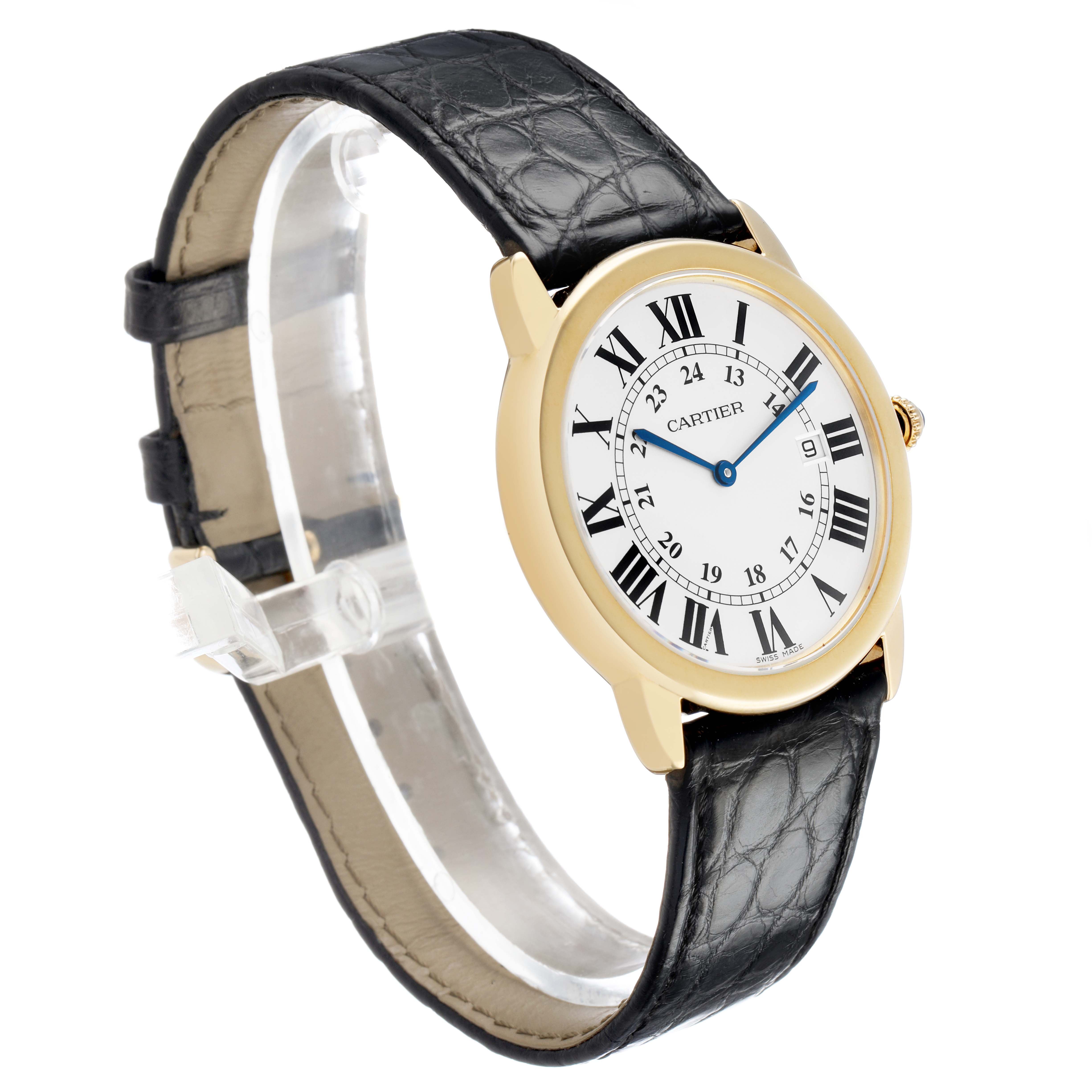 The Cartier Ronde W6700455 Men's Yellow Gold Silver Dial watch is shown at a three-quarter angle, displaying its round gold case, Roman numeral dial, and black leather strap.