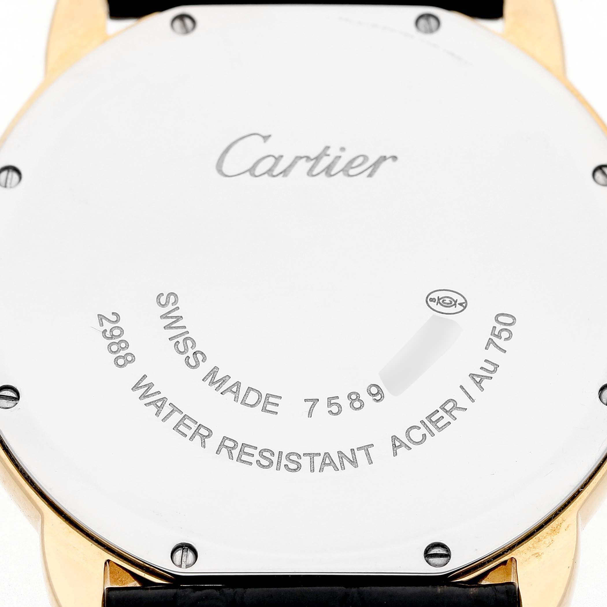 The image shows the back of a Cartier Ronde W6700455 Men's Yellow Gold Silver Dial watch, displaying the brand inscription and model details.