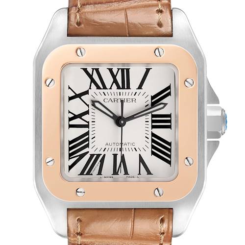 The Cartier Santos W20107X7 Men's Stainless Steel Silver Dial watch is shown from the front, featuring its square face, Roman numerals, and leather strap.