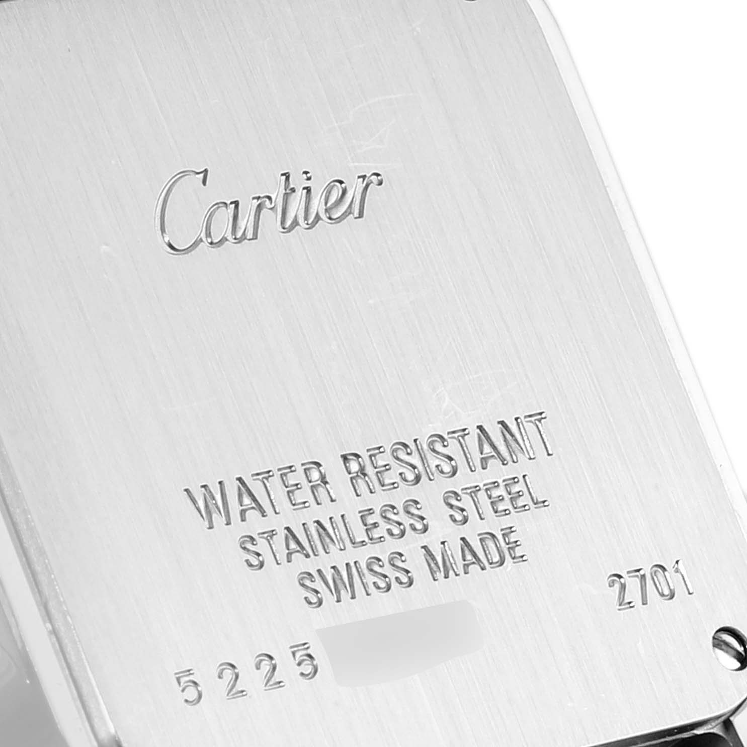 The image shows the back case of the Cartier Santos Demoiselle W25065Z5 Women's Stainless Steel Silver Dial W25065Z5 Women's Stainless Steel Silver Dial watch, highlighting the engraved brand and specifications.
