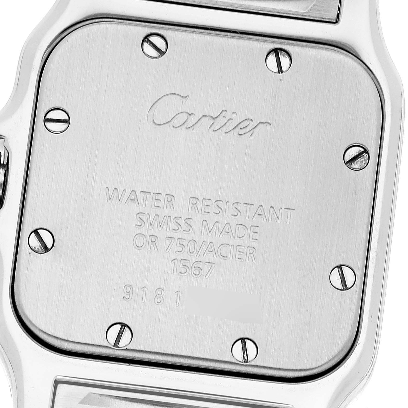 The image shows the back case of a Santos model watch by Cartier, displaying the brand, serial number, and specifications.