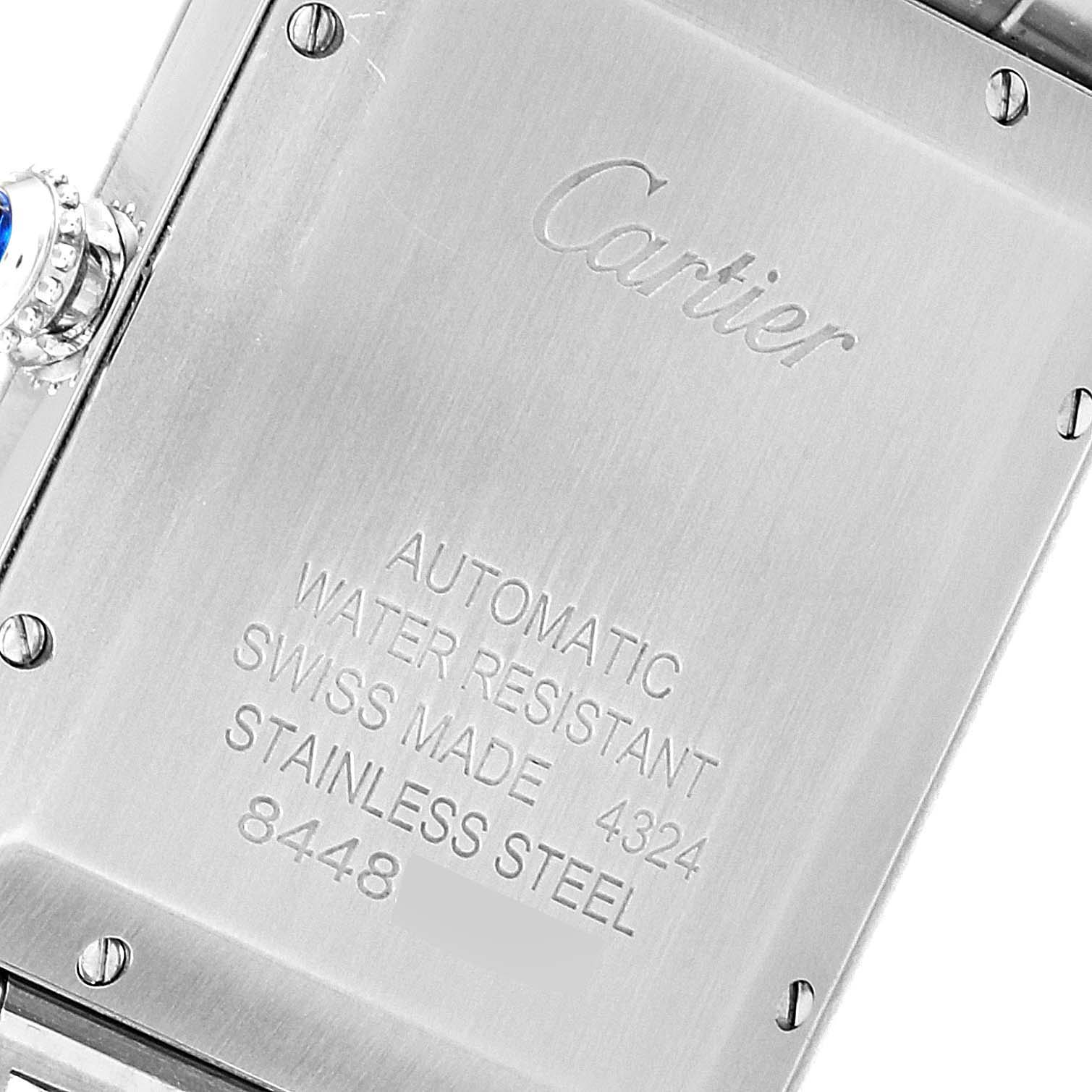 This image shows the etched back and the crown of the Cartier Tank Must WSTA0053 Men's Stainless Steel Silver Dial WSTA0053 Men's Stainless Steel Silver Dial watch.