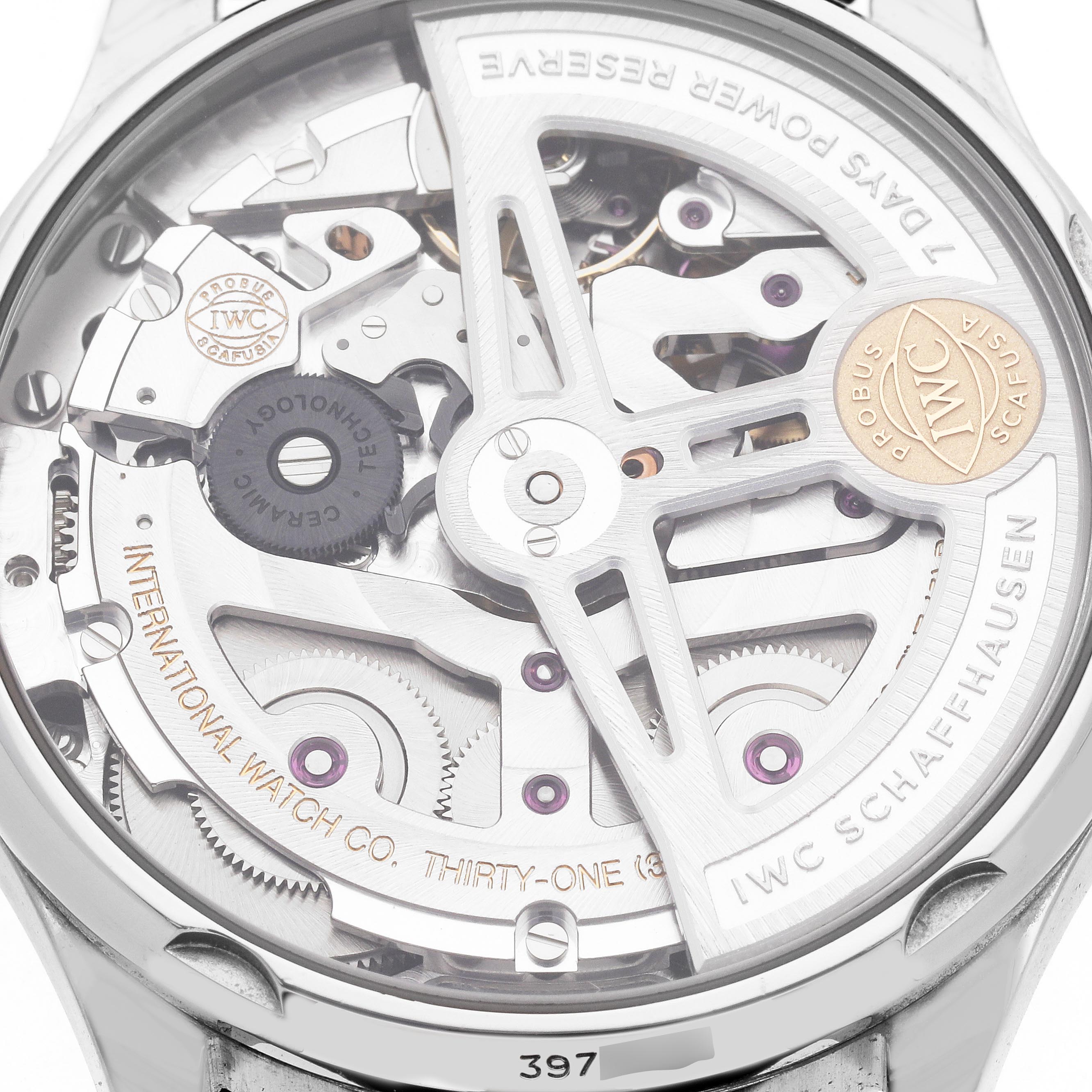 The image shows the back case of the IWC Portuguese IW500704 Men's Stainless Steel Silver Dial IW500704 Men's Stainless Steel Silver Dial watch, revealing its intricate movement and rotor.